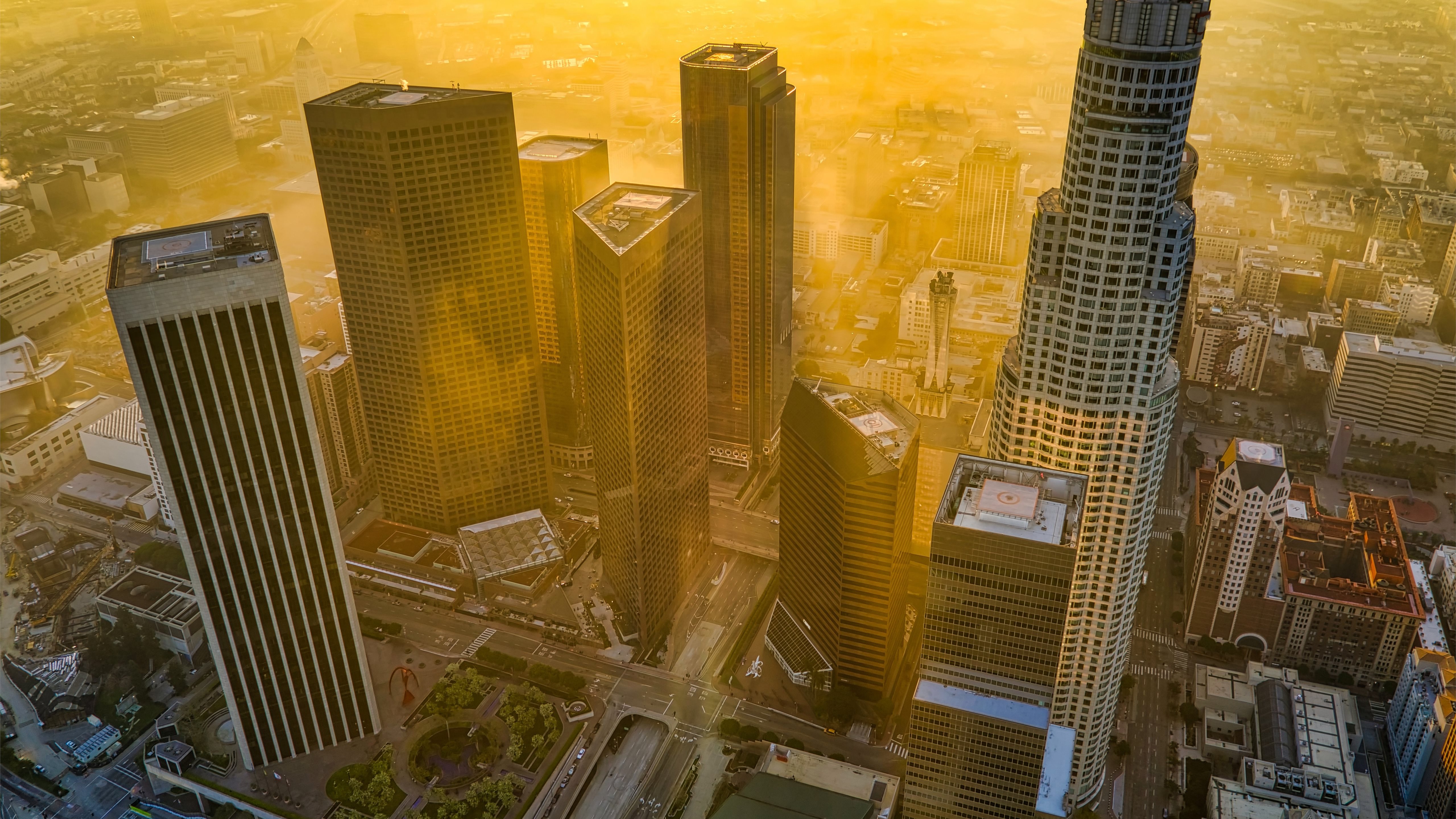 aerial view of city buildings during daytime MacBook Air Wallpaper Download
