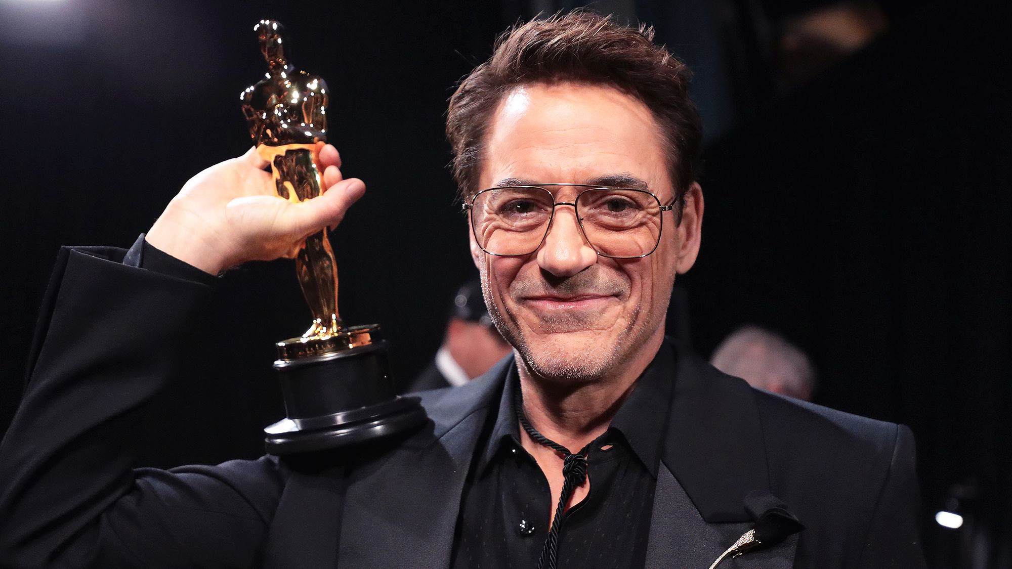 Oscar Awards Celebration Wallpaper with Celebrated Actor