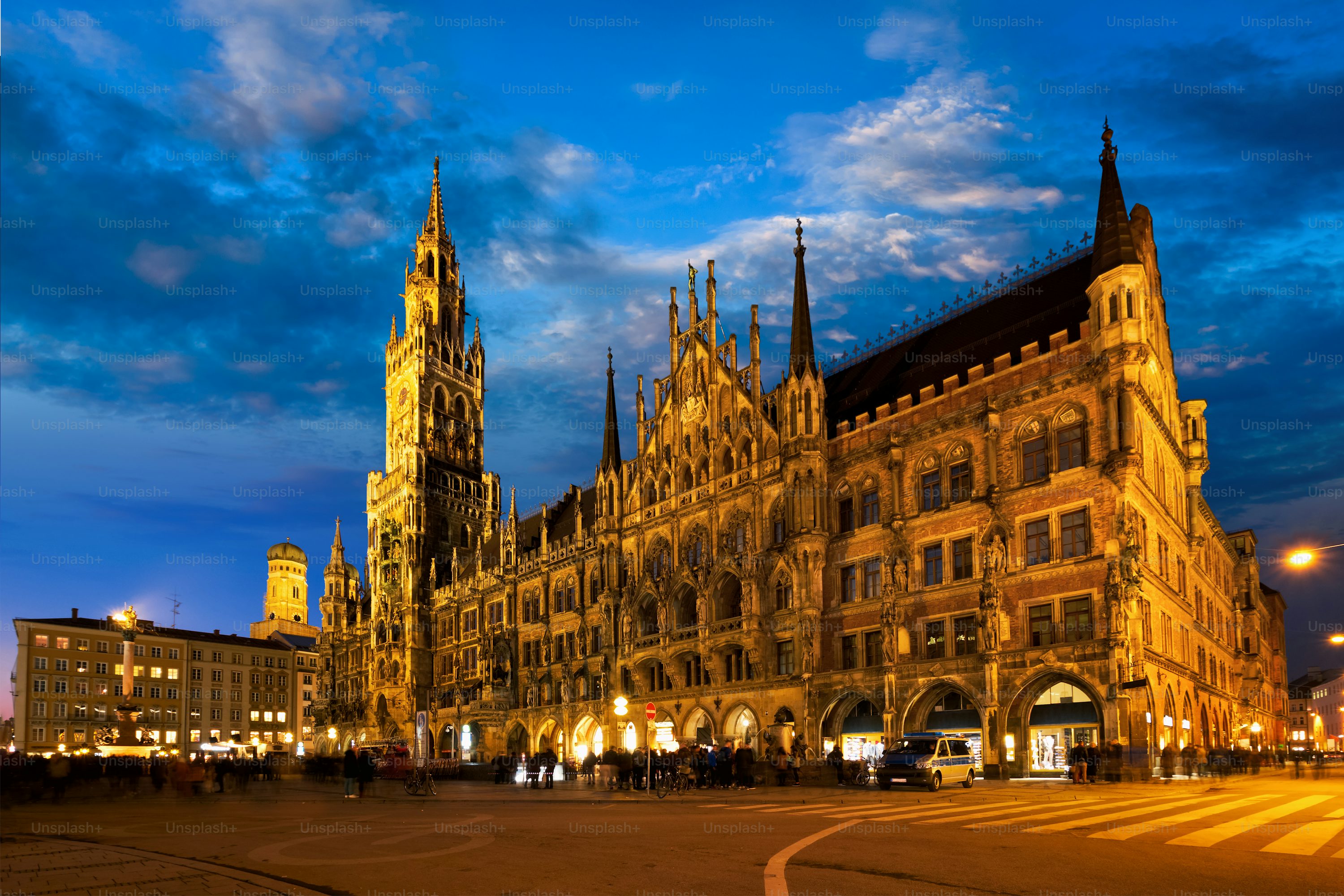 Marienplatz central square illuminated at night with New Town Hall (Neues Rathaus) famous tourist attraction. Munich, Germany photo