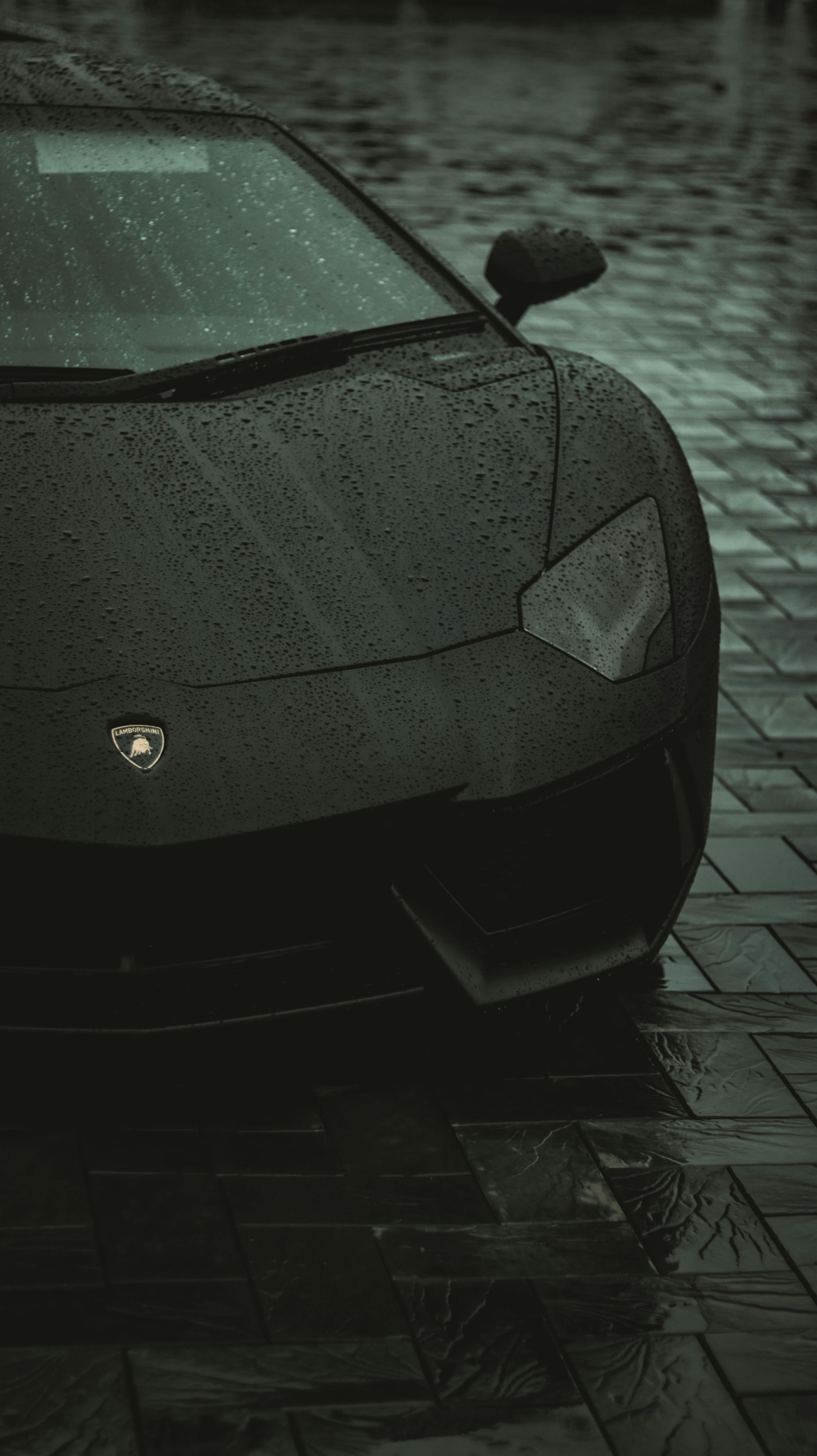 A Black Car on Gray Brick Floor · Free
