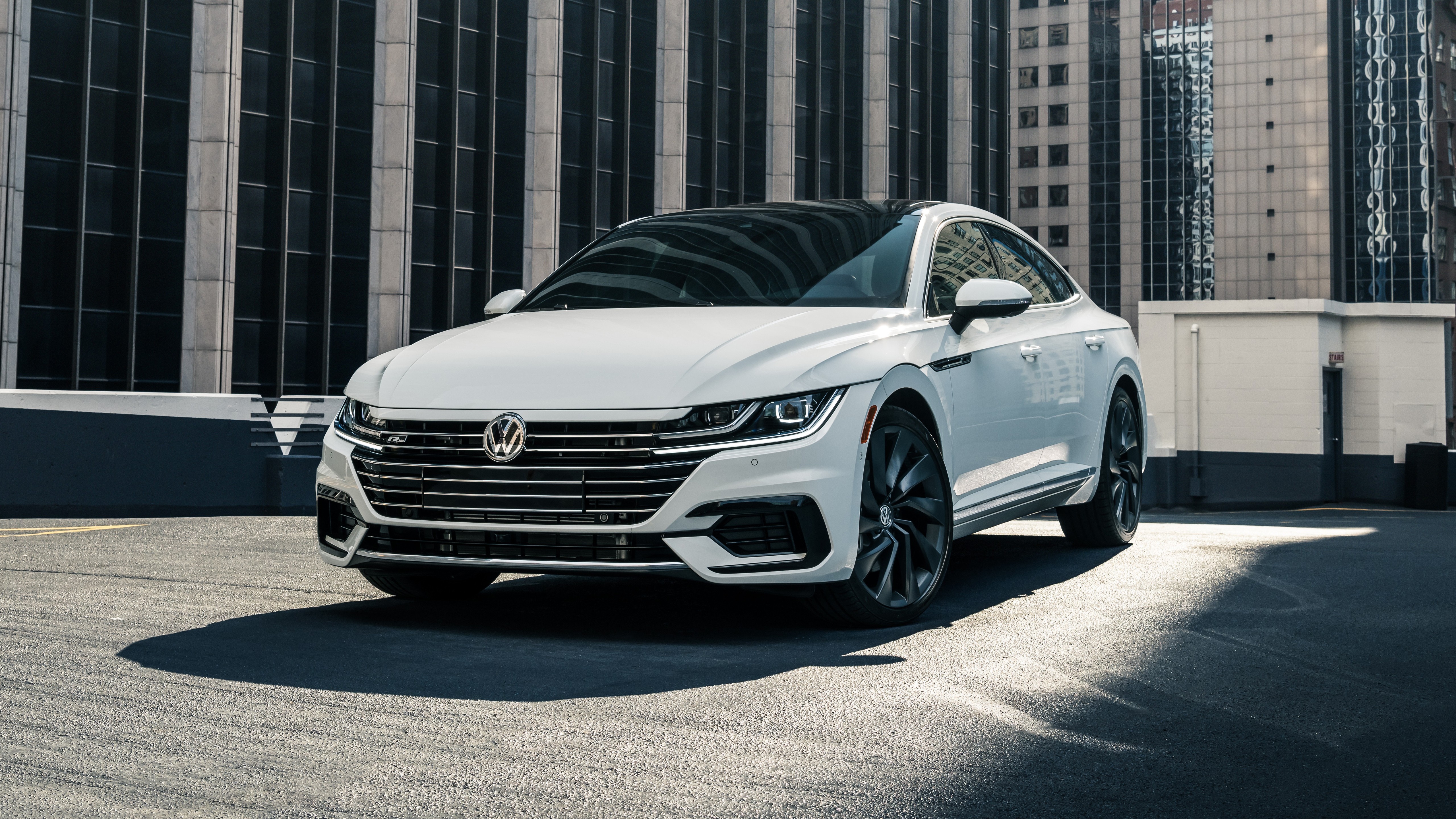 White car Volkswagen Arteon, 2019 in front of the building Desktop wallpaper 1440x900