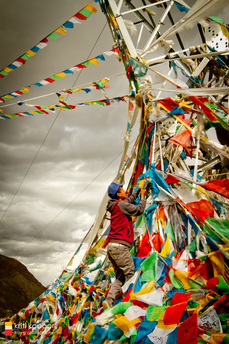 Prayer Flags route Lhasa to Kathmandu. The five colors represent the elements, are arranged from left to right in specific order: blue, white, red, green, and then yellow. Different elements