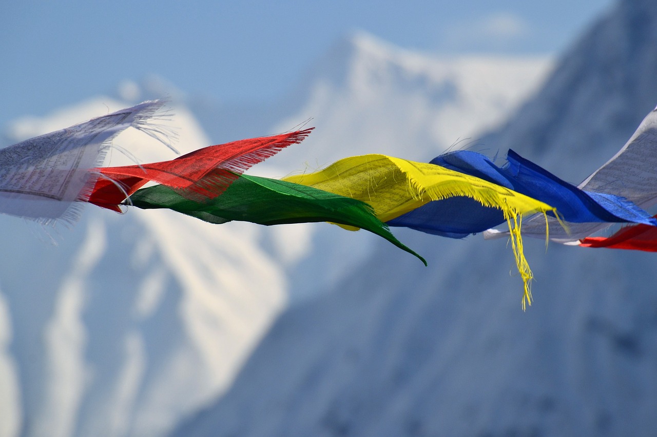 Download free photo of Tibetan prayer flags, flags, color, mountain, flag