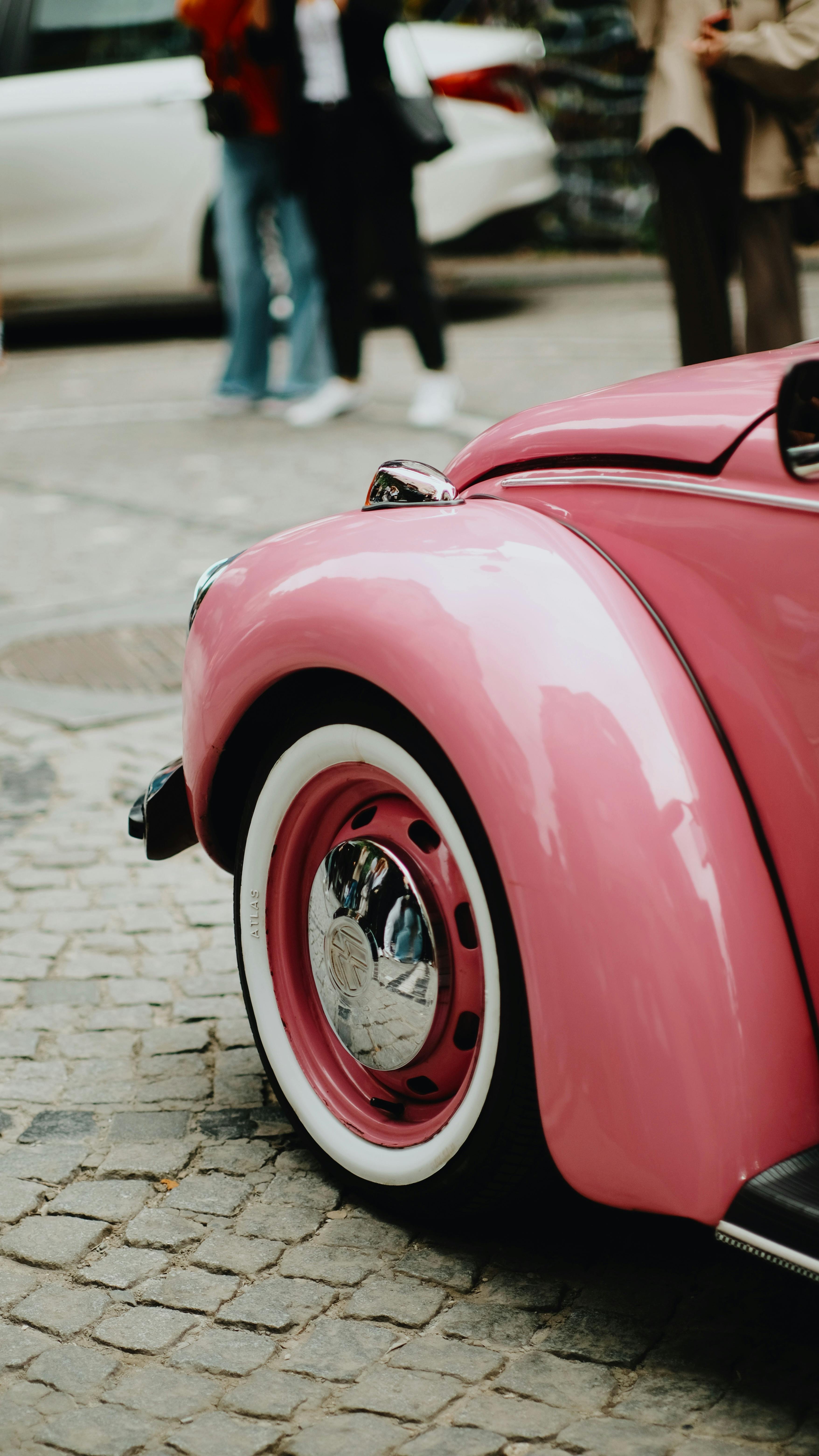 Wheel Arch of a Pink Volkswagen Beetle · Free