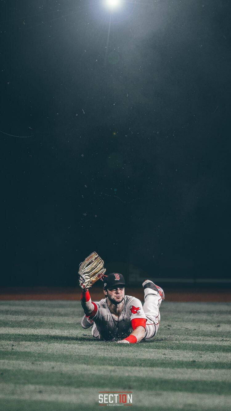 Download Red Sox Player Diving Forward Wallpaper