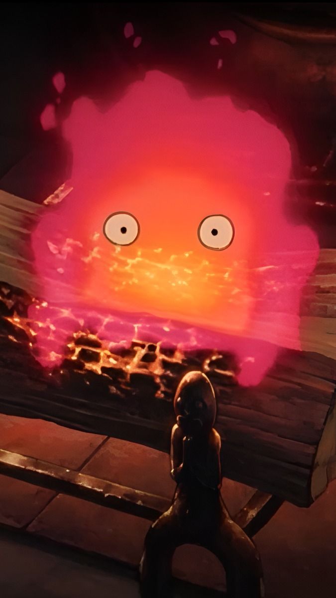 Howl's Moving Castle. Calcifer Yule Logk Aesthetic phone wallpaper