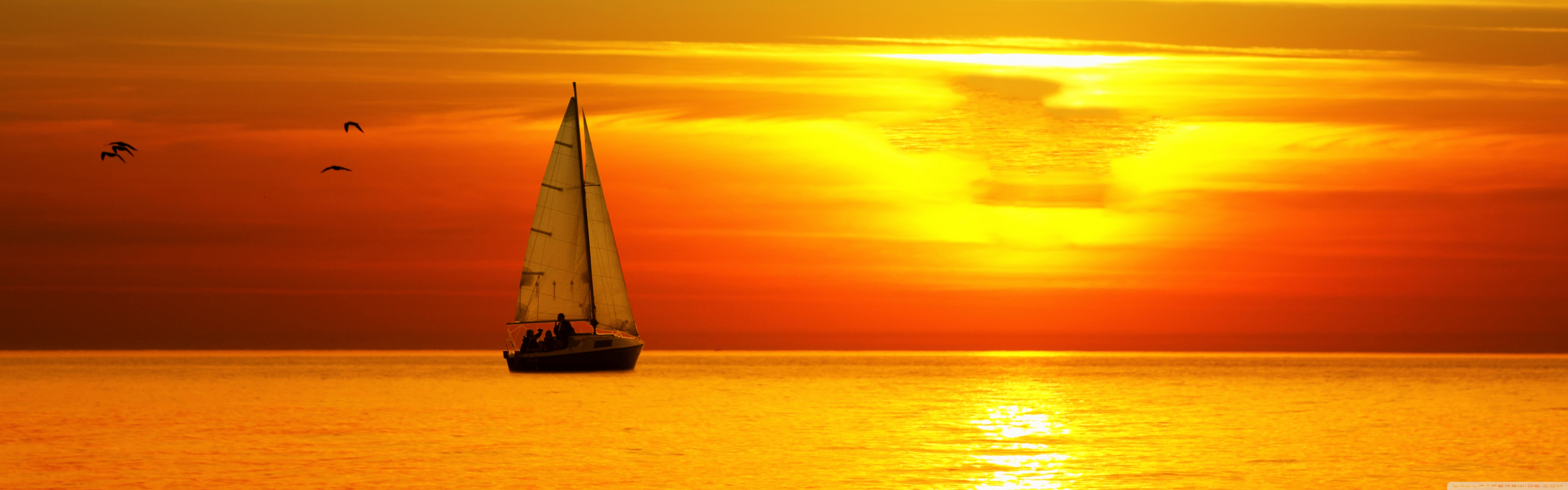 Sailing Boat At Sunset 4K UHD Wallpaper for UltraHD Desktop and TV, Dual Monitor, Smartphone and Tablet Devices