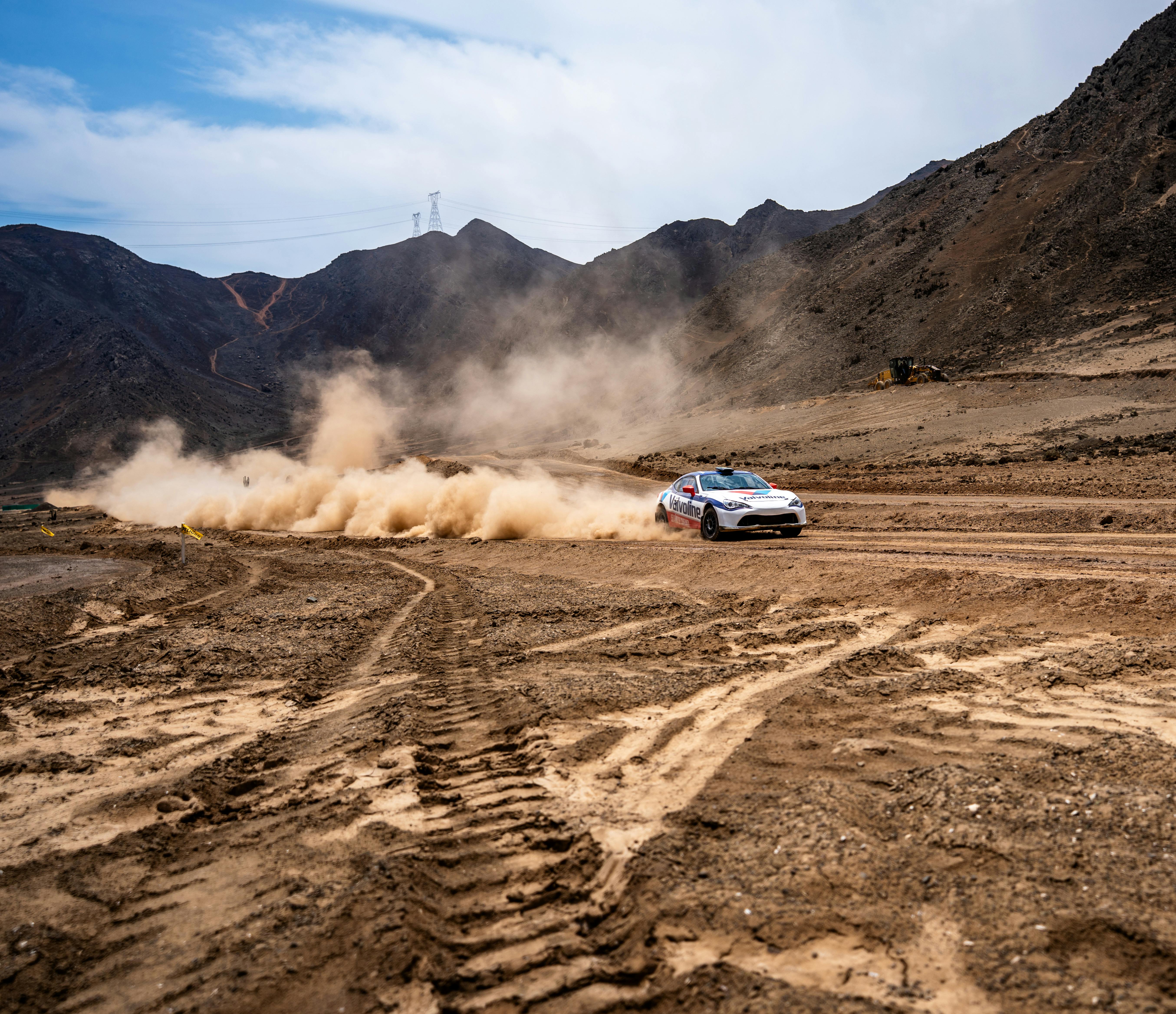 High Speed Rally Car Racing On Dusty Mountain Trail · Free