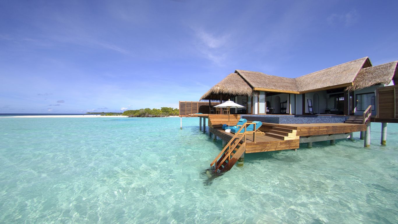 Download wallpaper 1366x768 maldives, tropical, bungalows tablet, laptop HD background