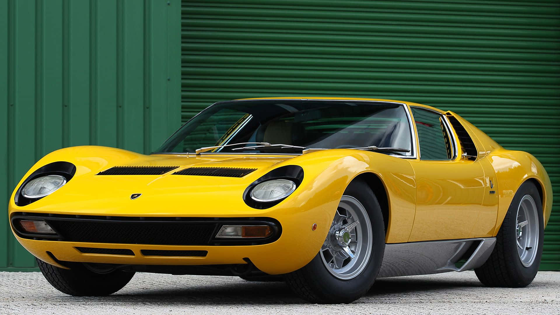 Download Classic Lamborghini Miura in Vibrant Yellow Wallpaper