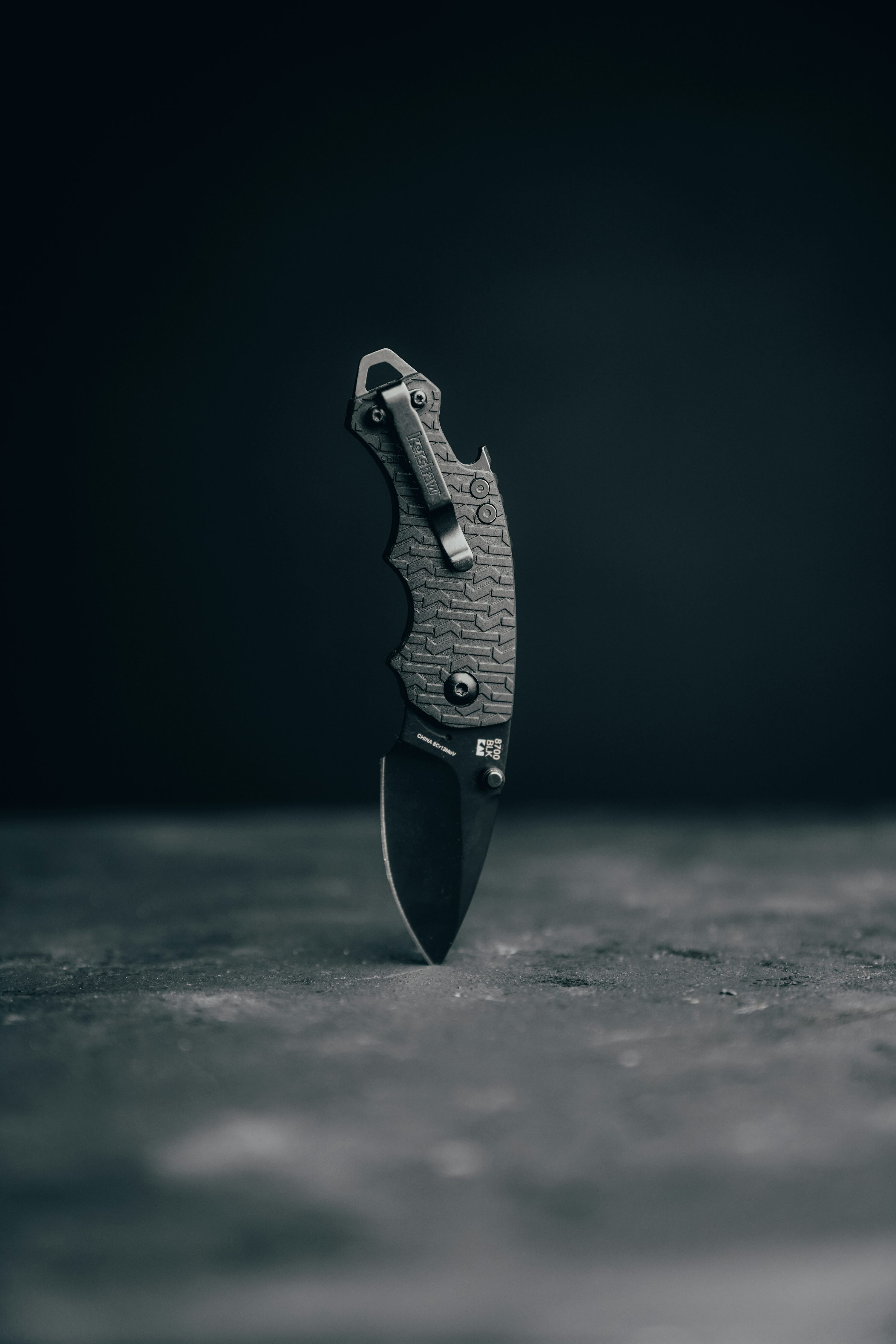 Black and silver folding knife photo