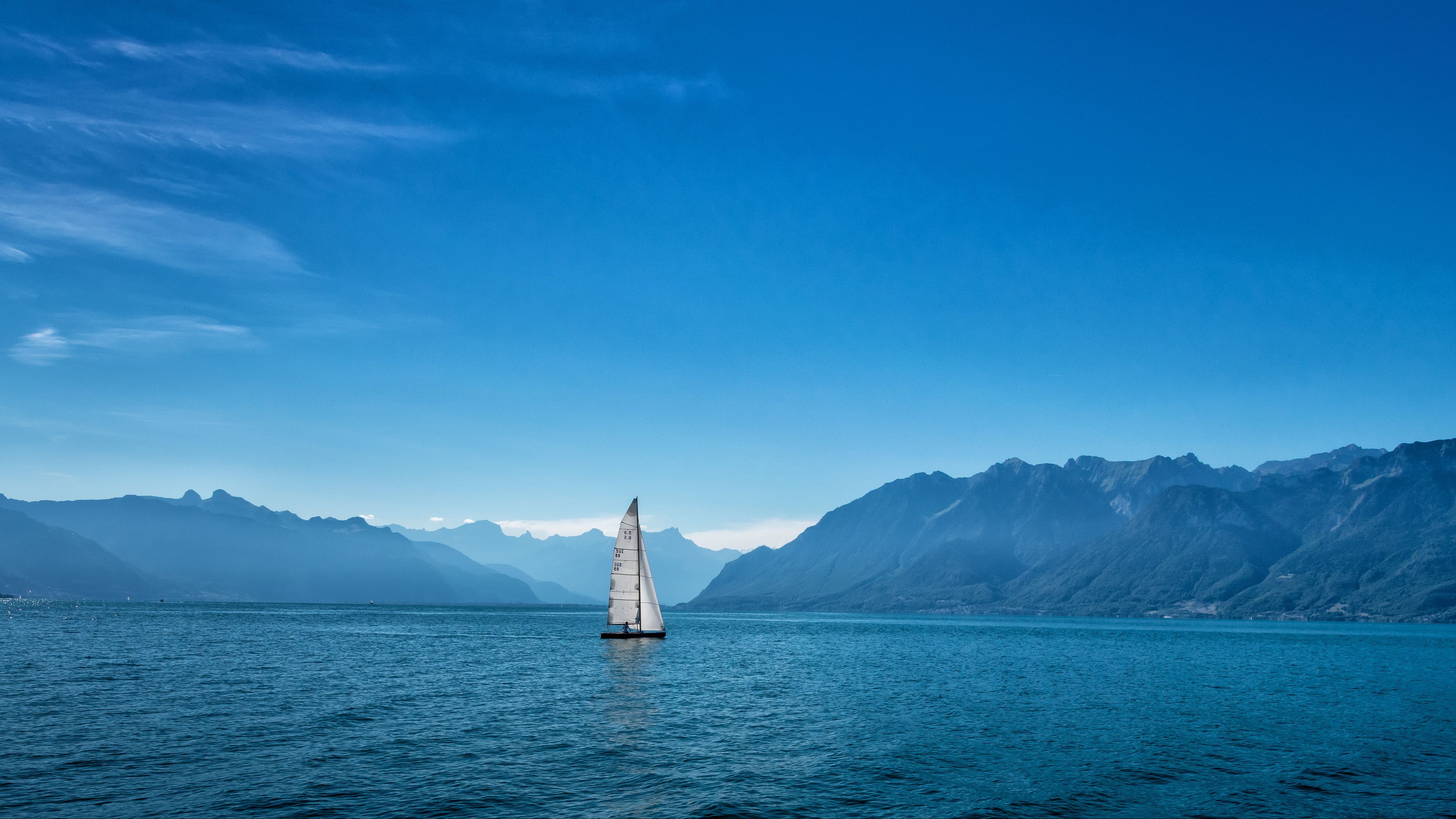 Download Mountain Ocean Sea Sky Vehicle Sailboat 4k Ultra HD Wallpaper