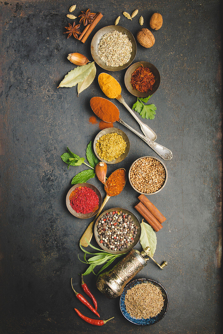 Oriental herbs and spices on dark