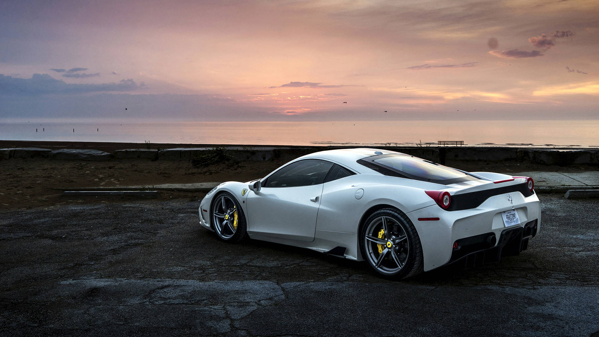 Download White Ferrari Under Pink Skies Wallpaper