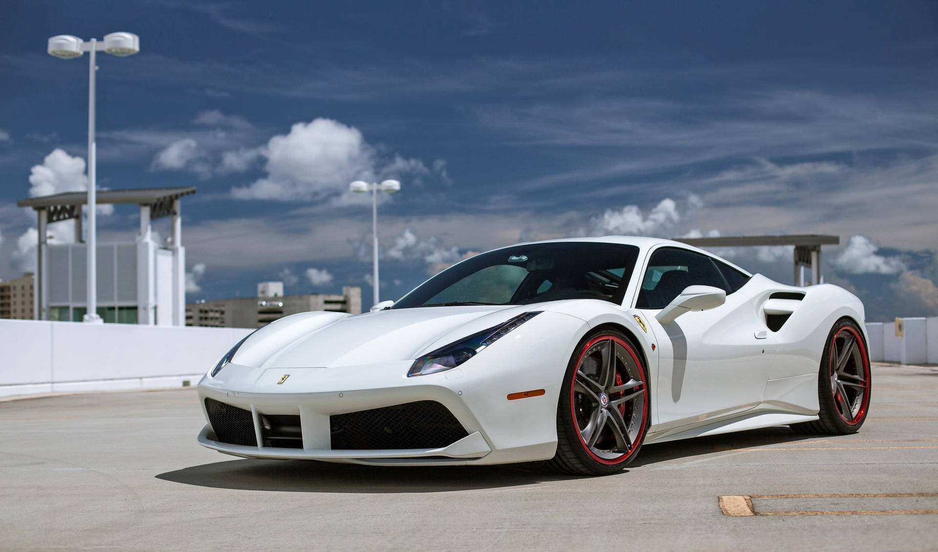 Download White Ferrari On Rooftop Wallpaper