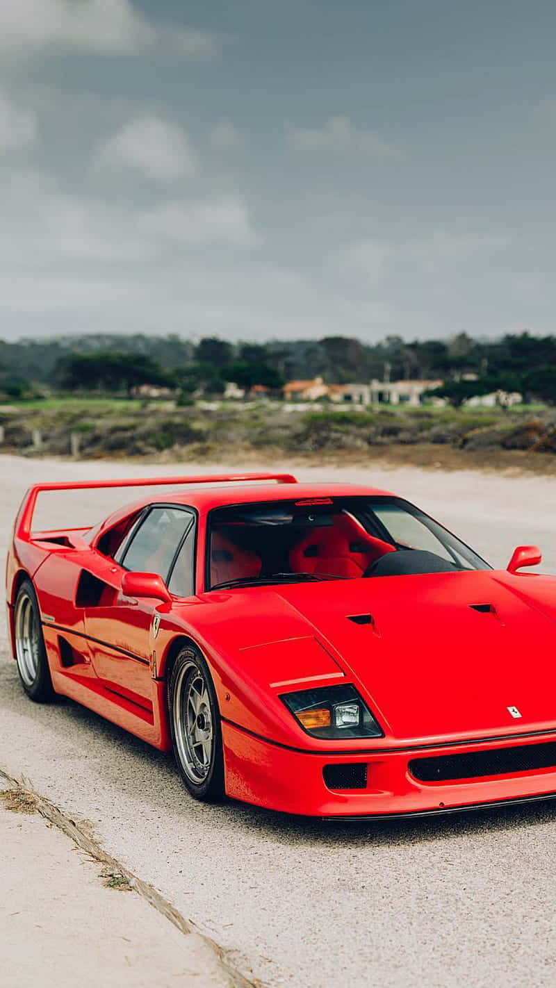 Download Take a Trip Back in Time with this Beautiful Vintage Ferrari Wallpaper