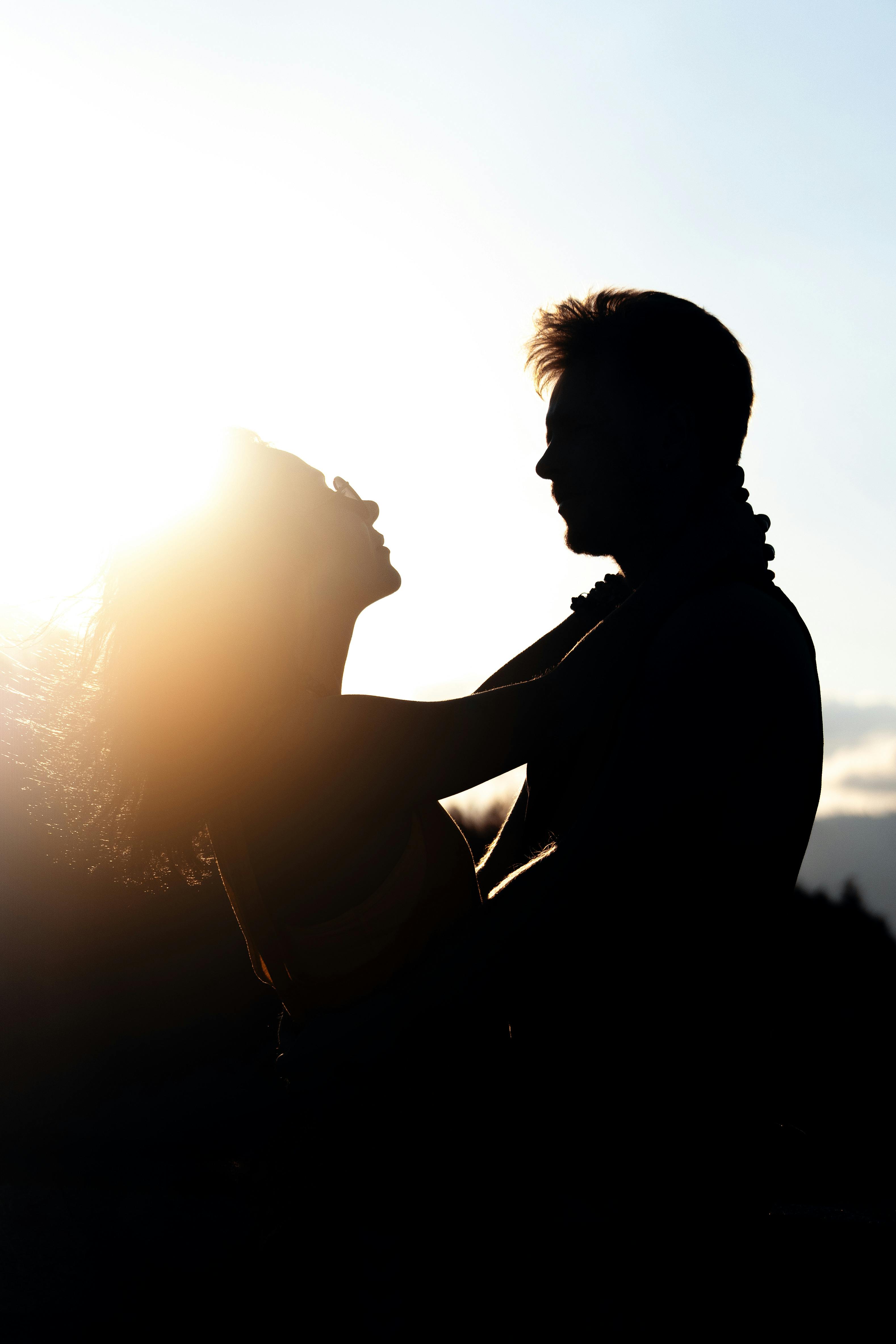 Silhouette of a Couple on a Beach · Free