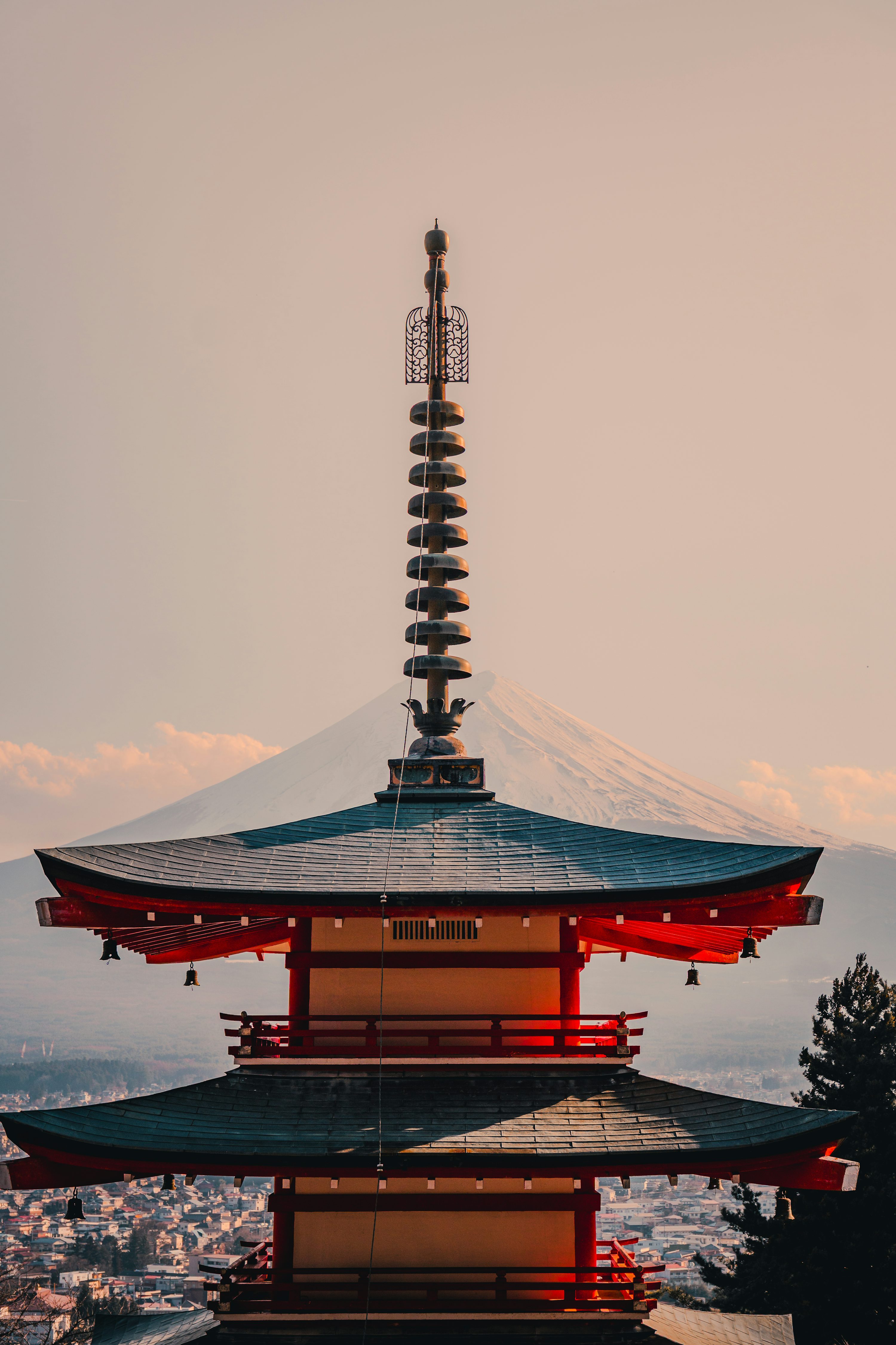 Japanese pagoda with mount fuji in the background. photo