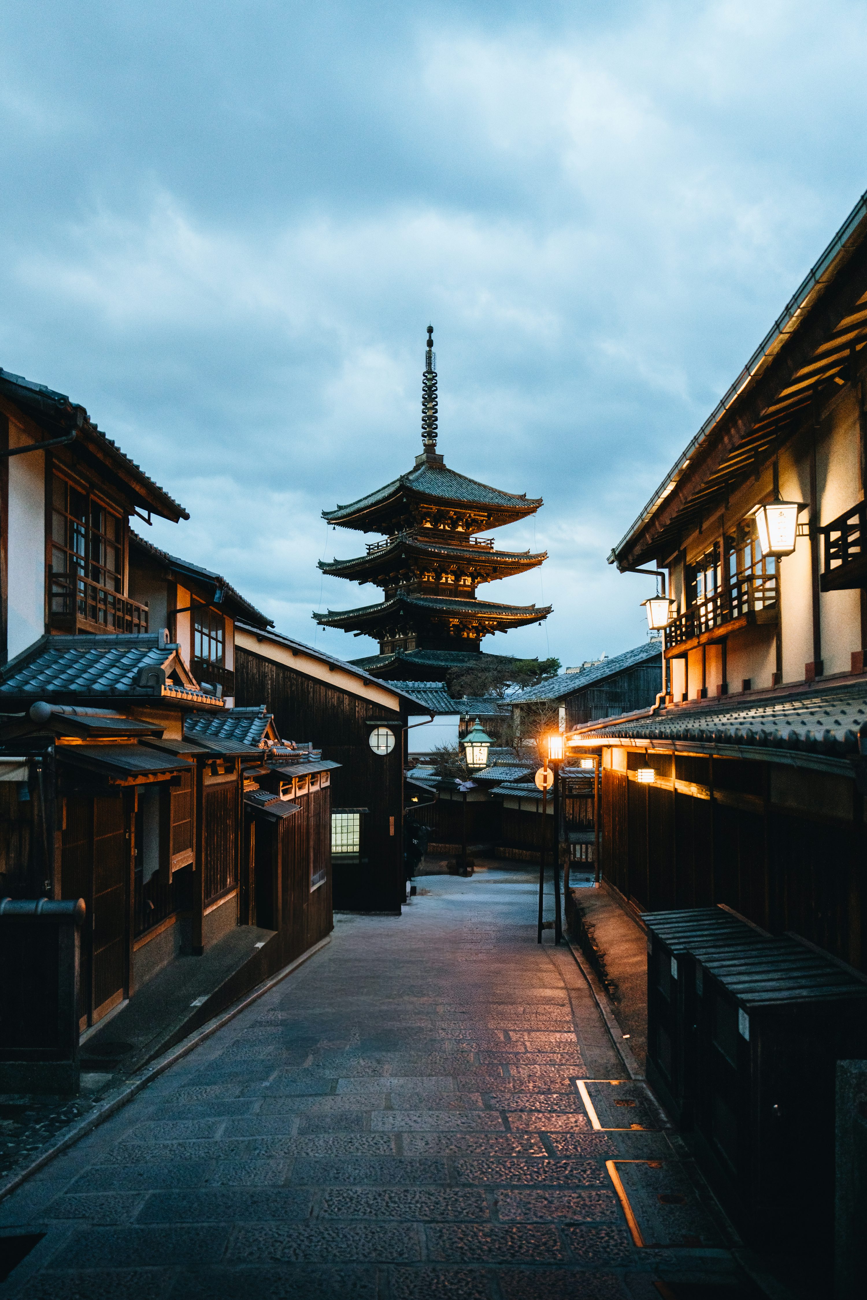 A temple stands tall in a japanese street. photo