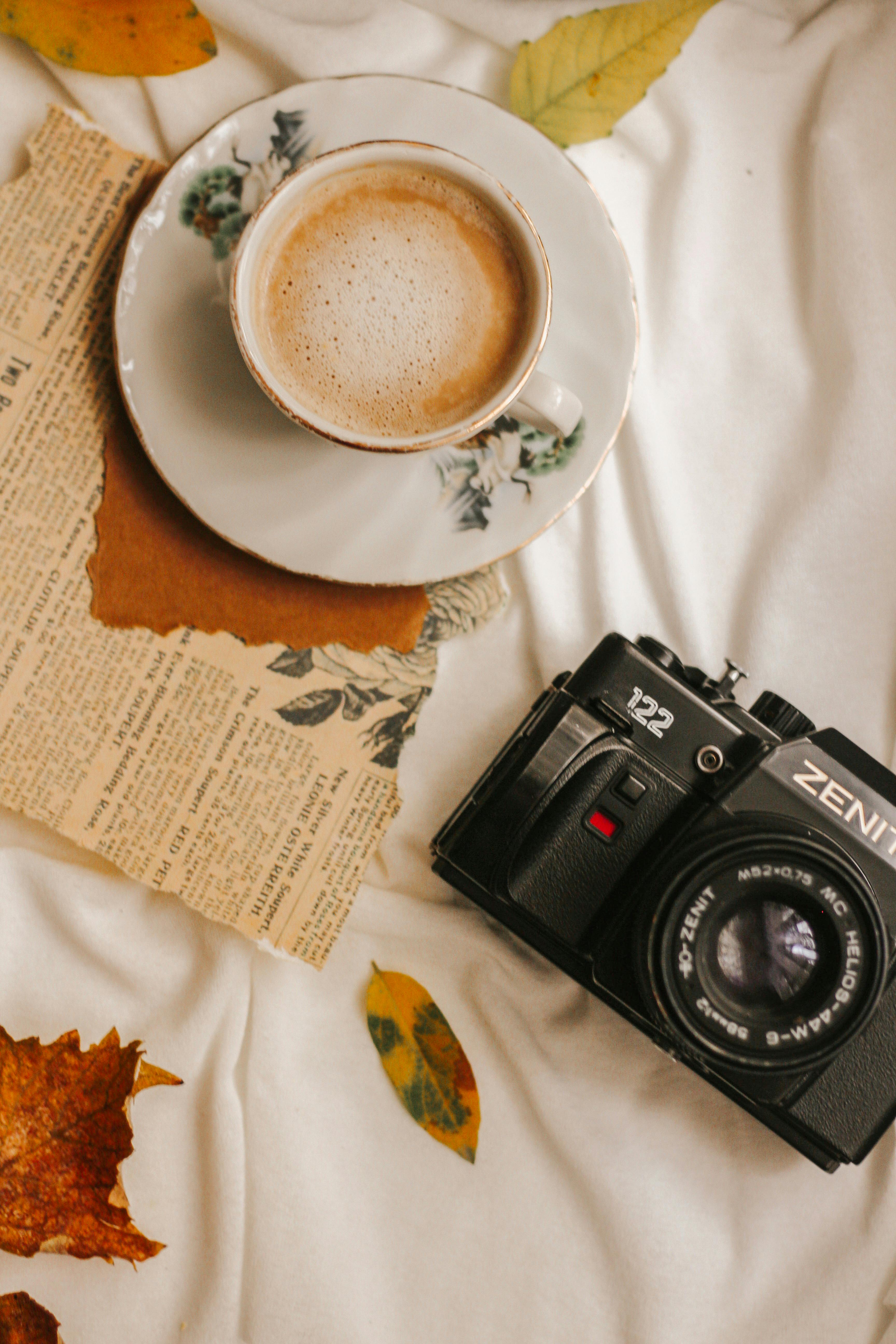 Vintage Camera and Coffee with Autumn Leaves · Free