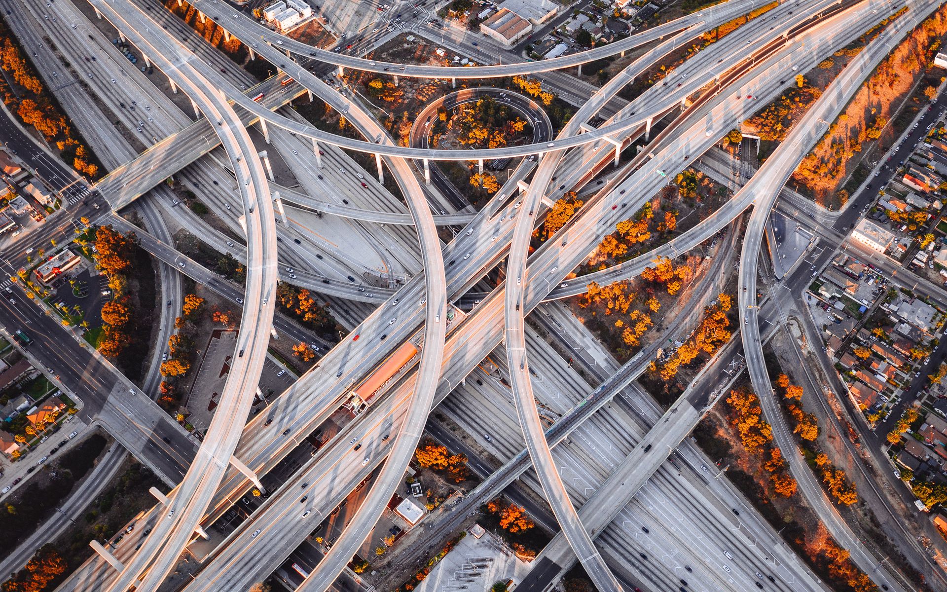 Download wallpaper 1920x1200 road junction, roads, aerial view, interchange road, fork, sunset, los angeles widescreen 16:10 HD background