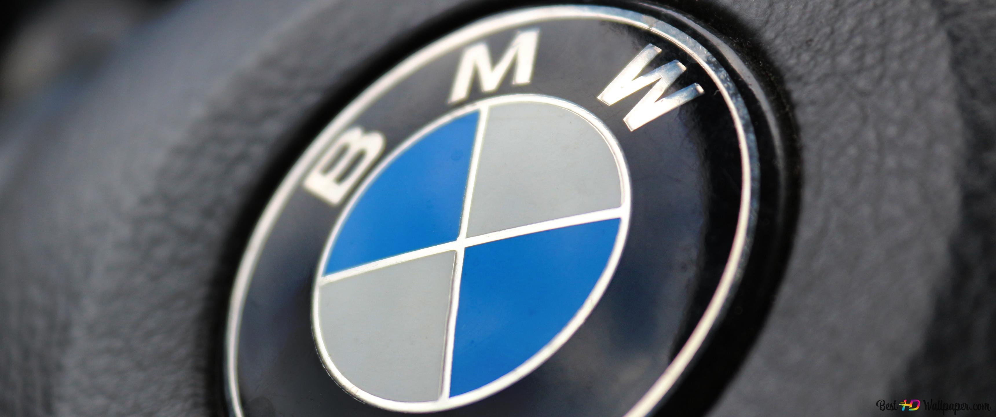 BMW logo on a steering wheel 4K wallpaper download