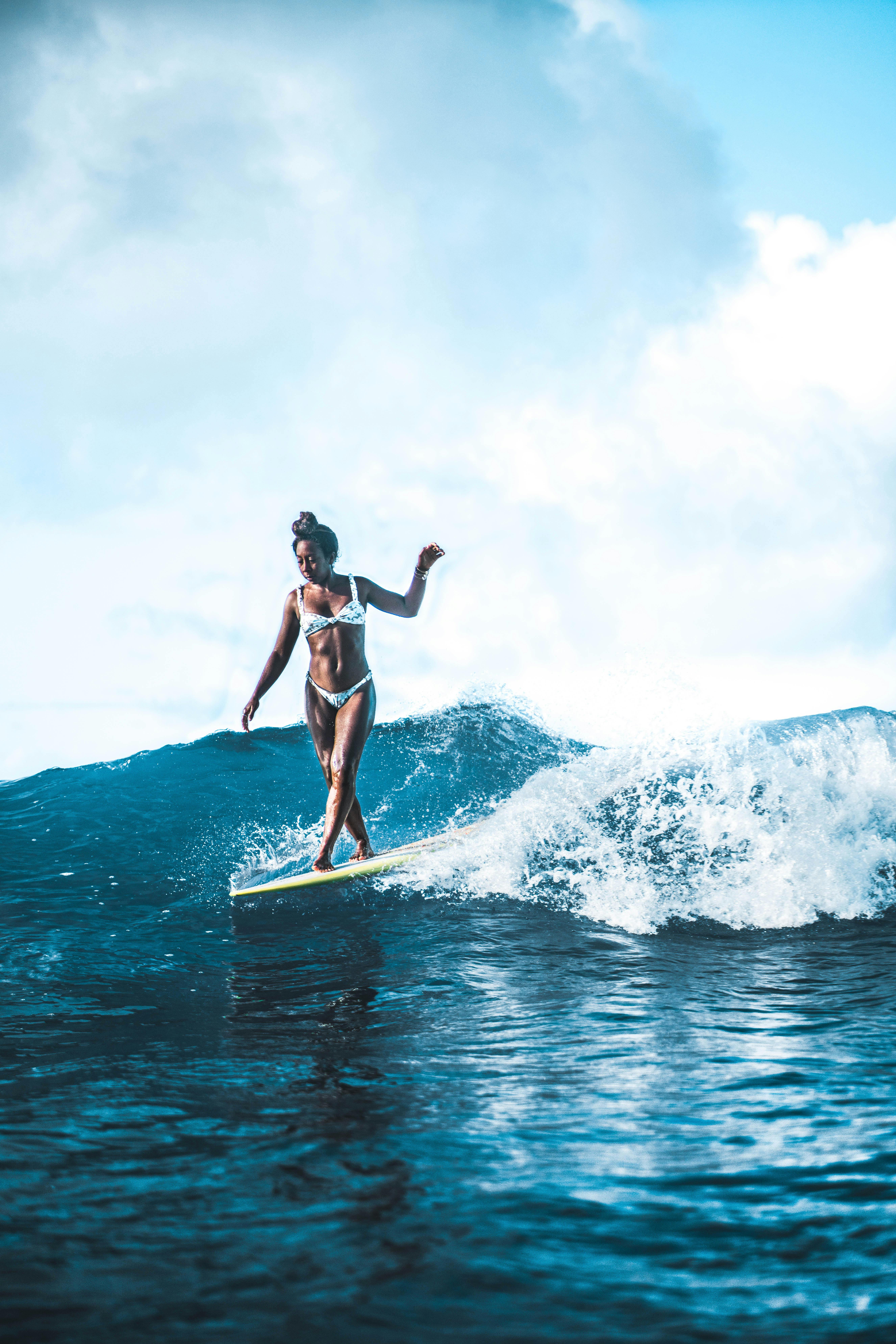 Woman Surfing on Sea Waves · Free