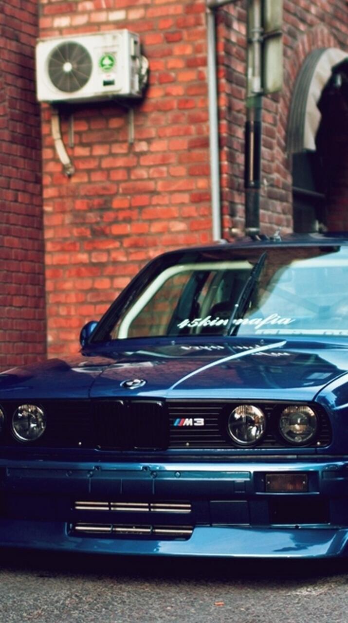 An old bmw m3 in blue is standing outside the restaurant · 720x1280 HD free photo from arashilkis and wallpaper
