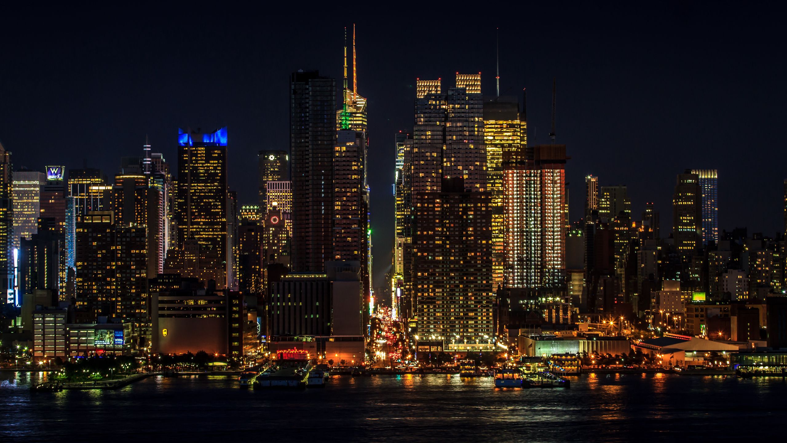 Download wallpaper 2560x1440 cityscape, night, new york, manhattan, skyscrapers, lights widescreen 16:9 HD background