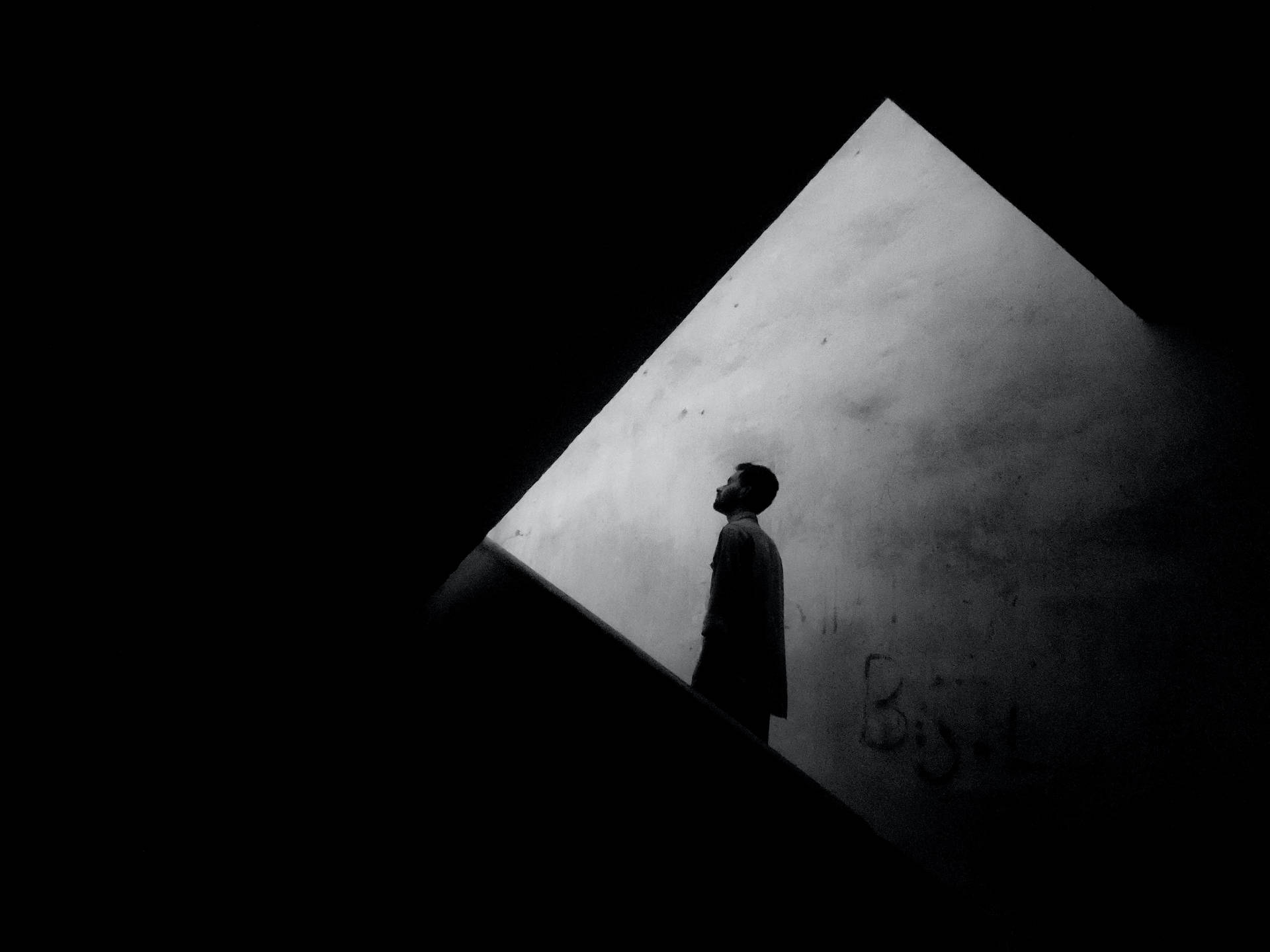 Download Pessimistic Shadowed Man Wallpaper