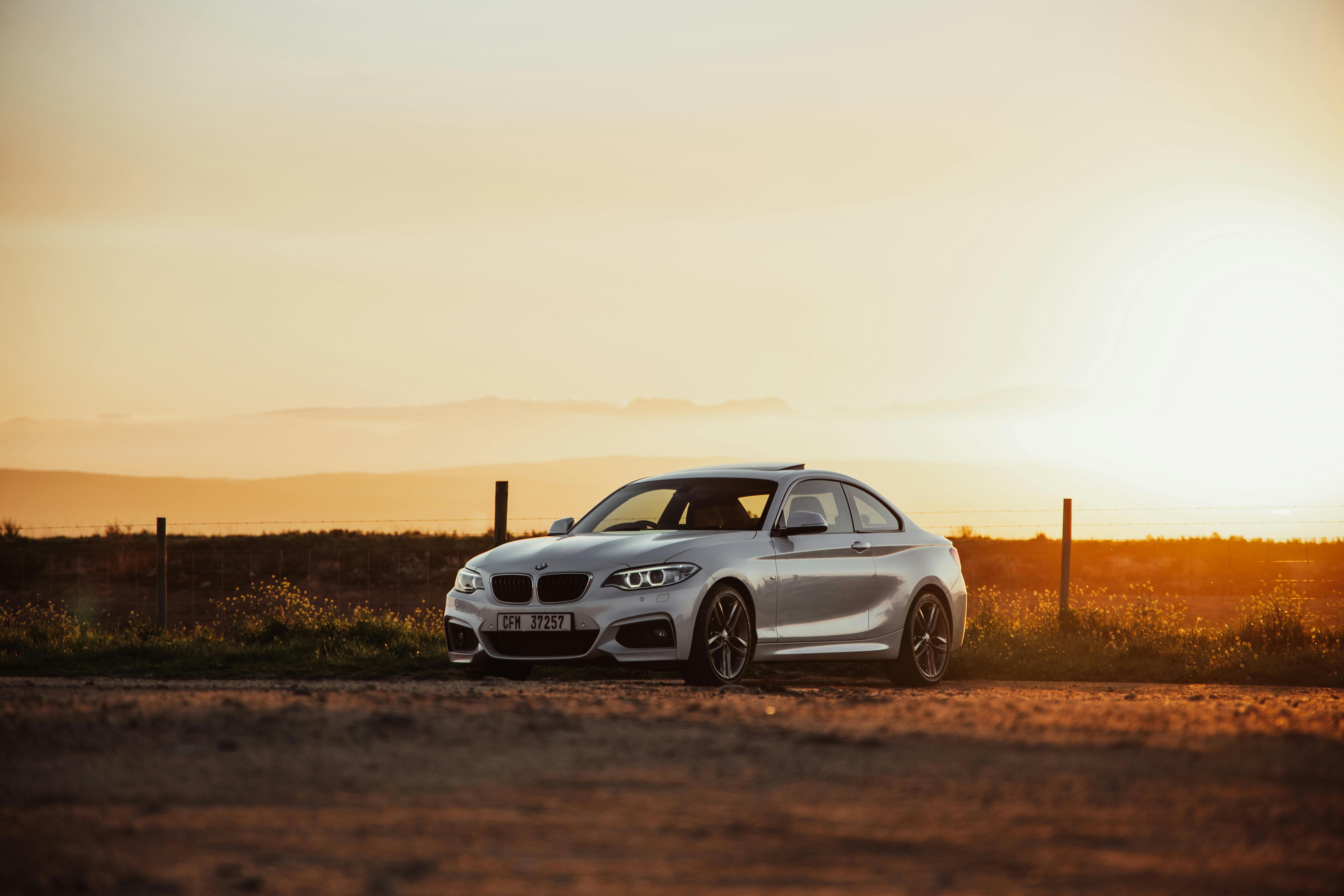 Parked White BMW Coupe · Free