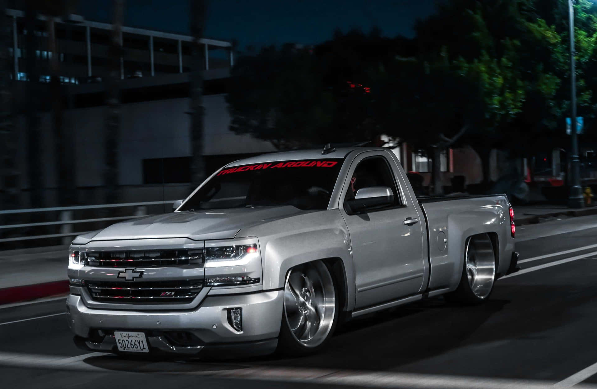 Download Silver_ Pickup_ Truck_ Night_ Cruise_ Trokiando_ Wallpaper