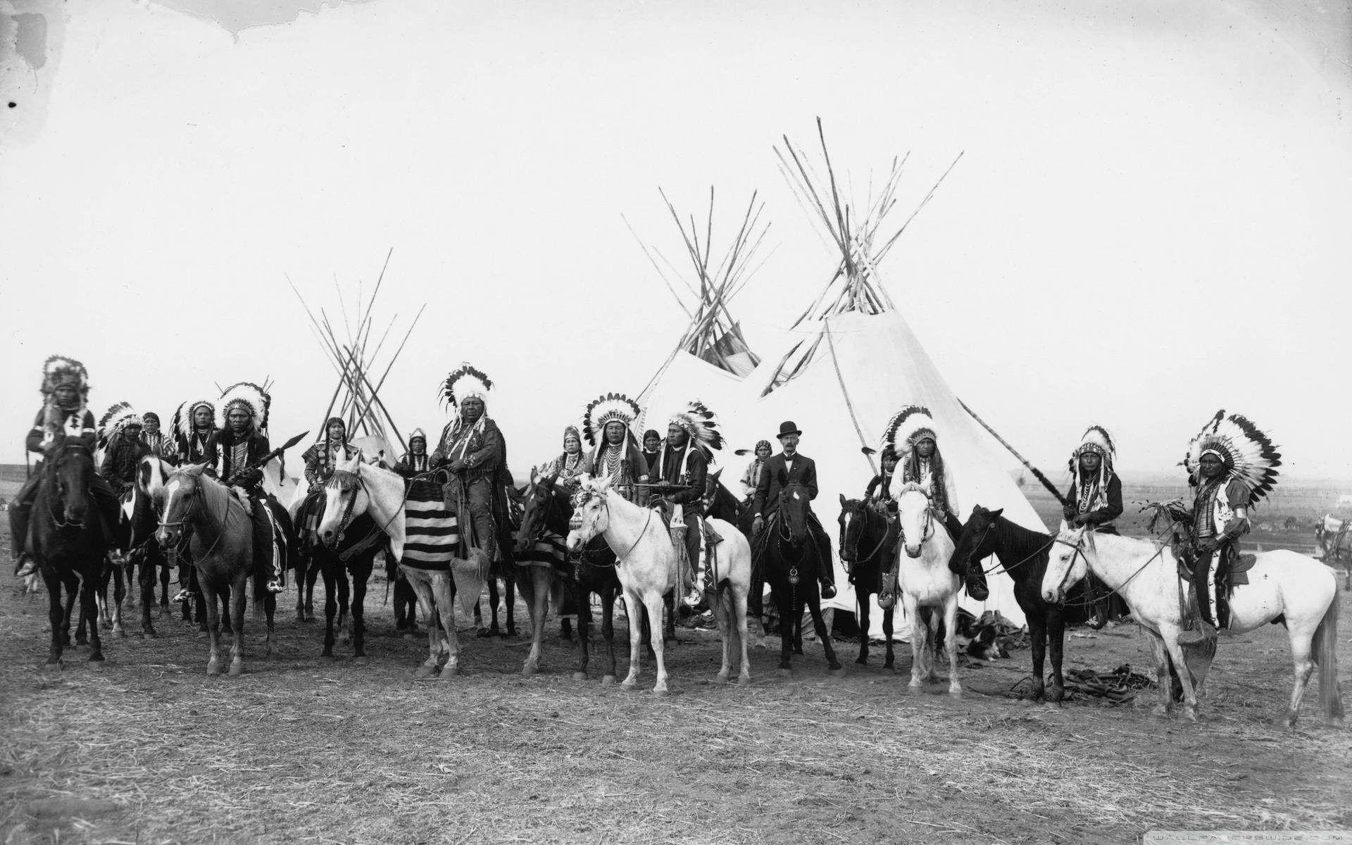 Download Cool Native American Tribe With Horses Wallpaper