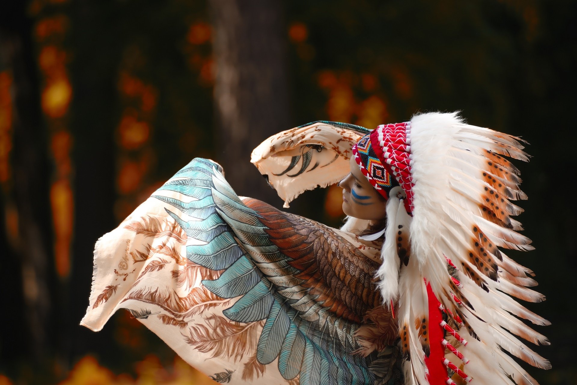 Majestic Native American Woman in Feathered Headdress