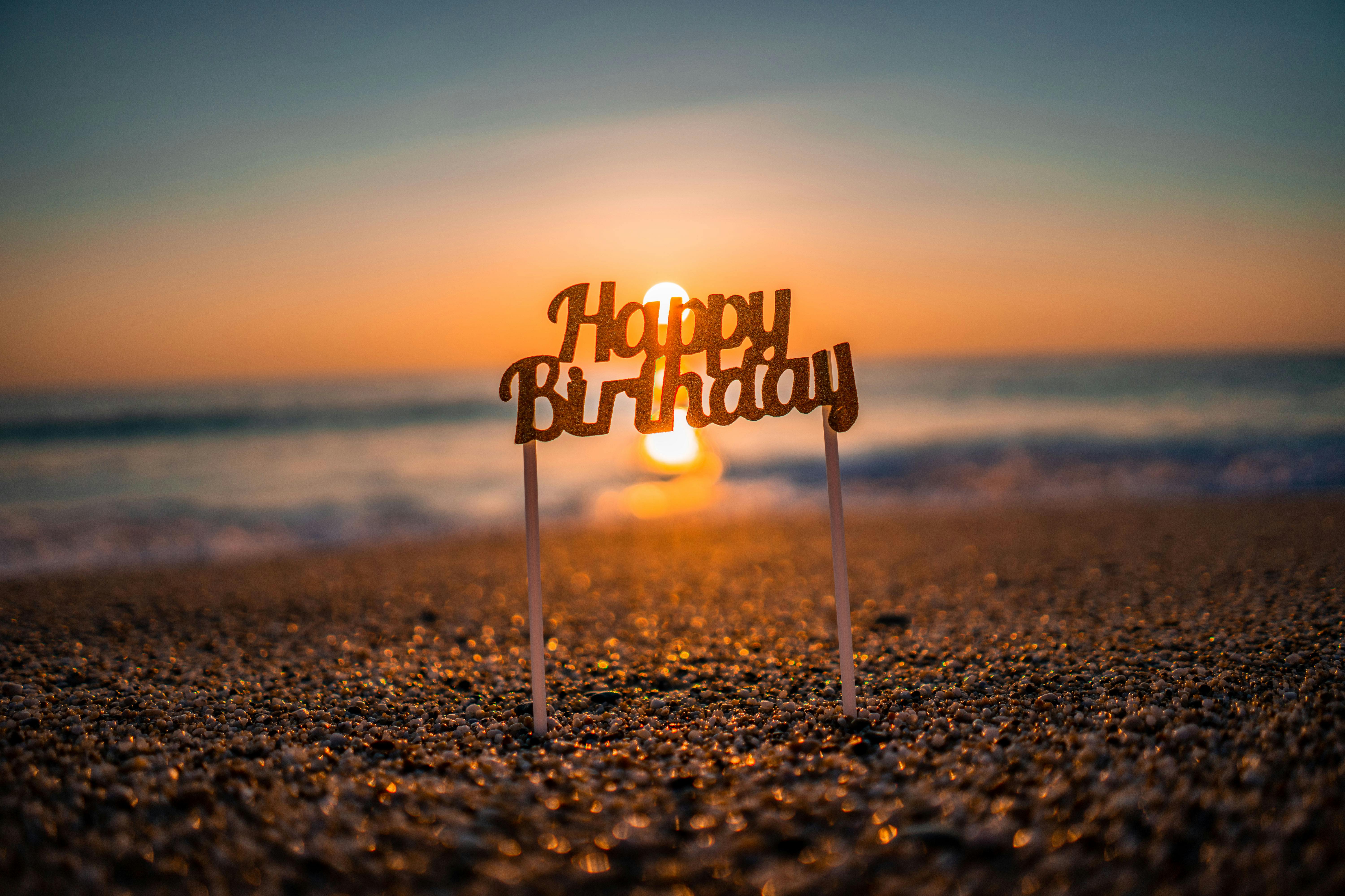 Happy Birthday Sign on a Beach · Free