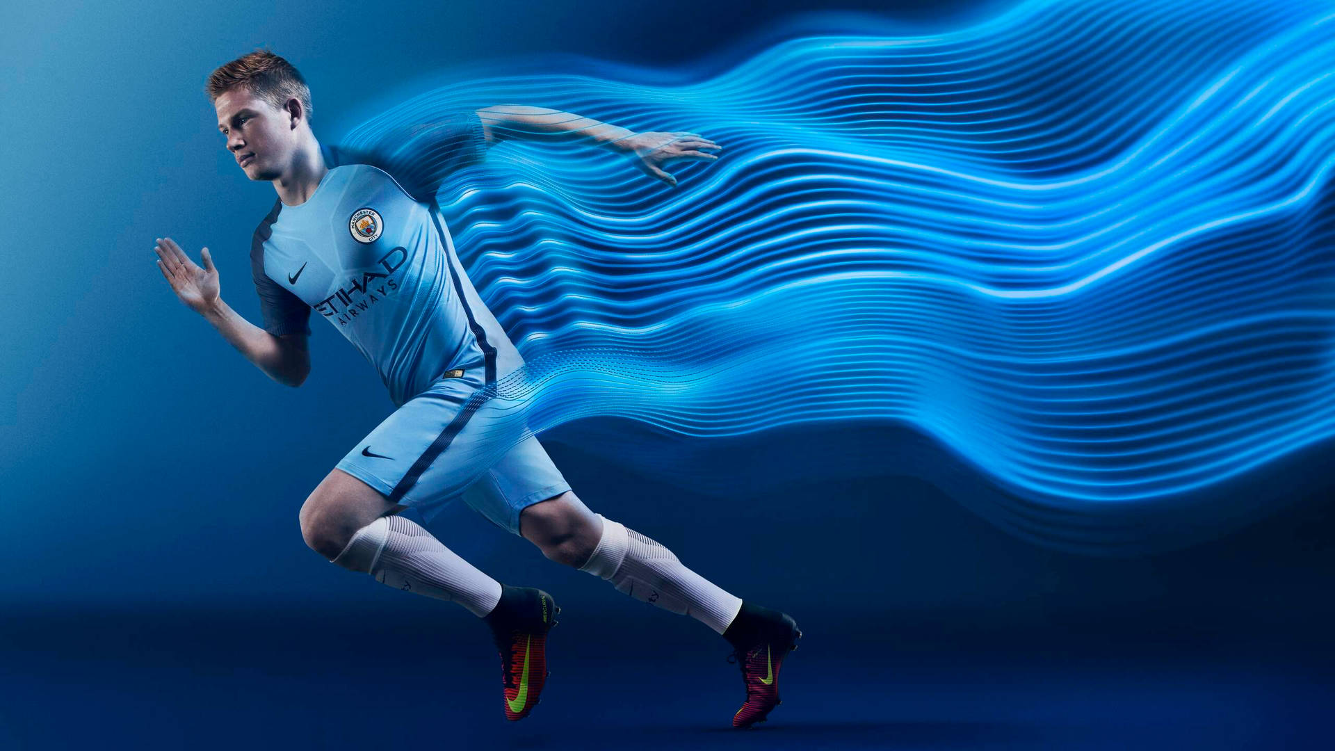 Download 2560x1440 Soccer Player Running Wallpaper