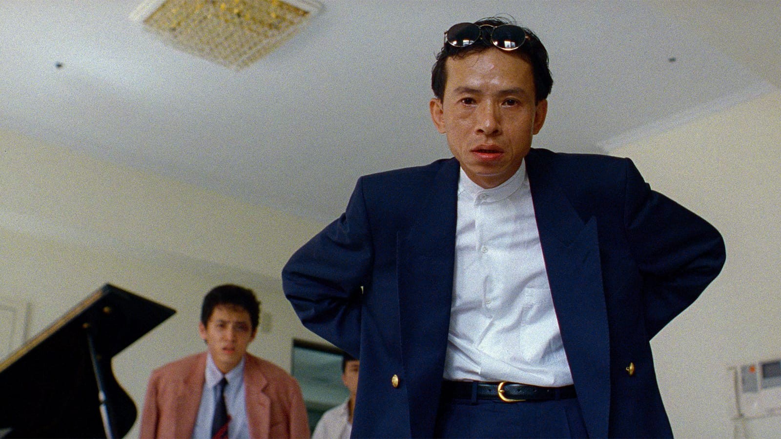 Austin Film Society Yang's dark screwball comedy follows two thugs tailing the son of a Taipei businessman who died in debt to the mob. Both a critique of and
