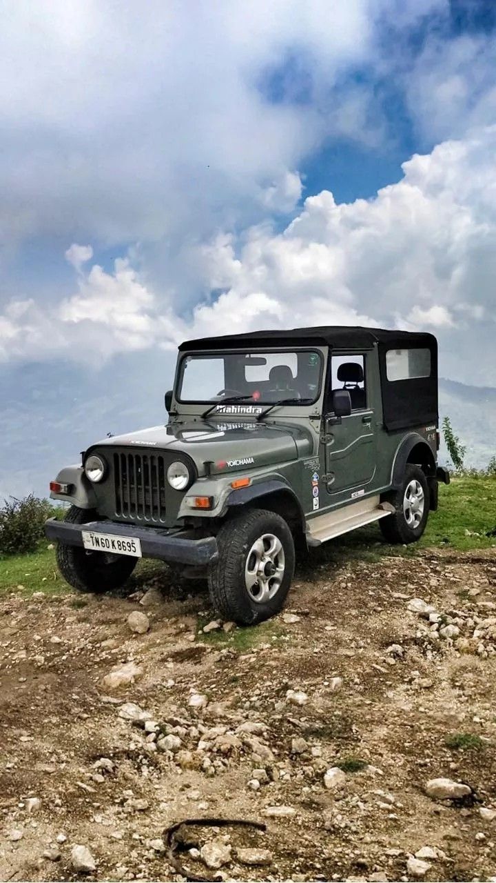 Green Jeep on Rocky Hill