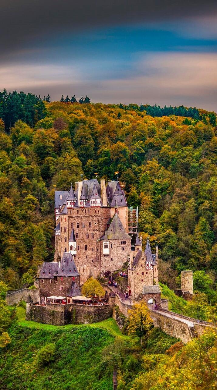 Eltz Castle in Germany amidst a forest · 720x1280 HD free photo from bradeya and wallpaper