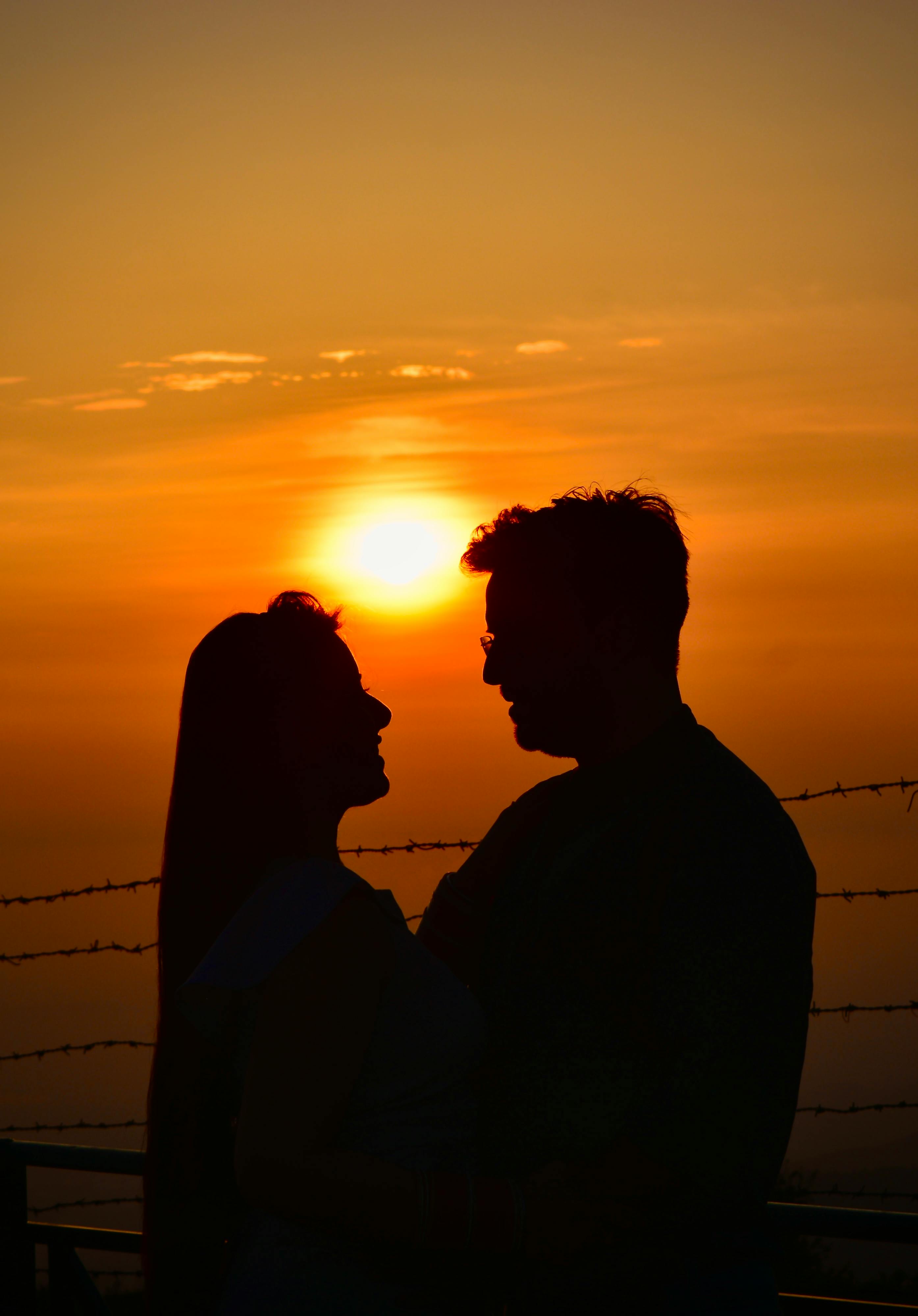Silhouette of Couple During Sunset · Free