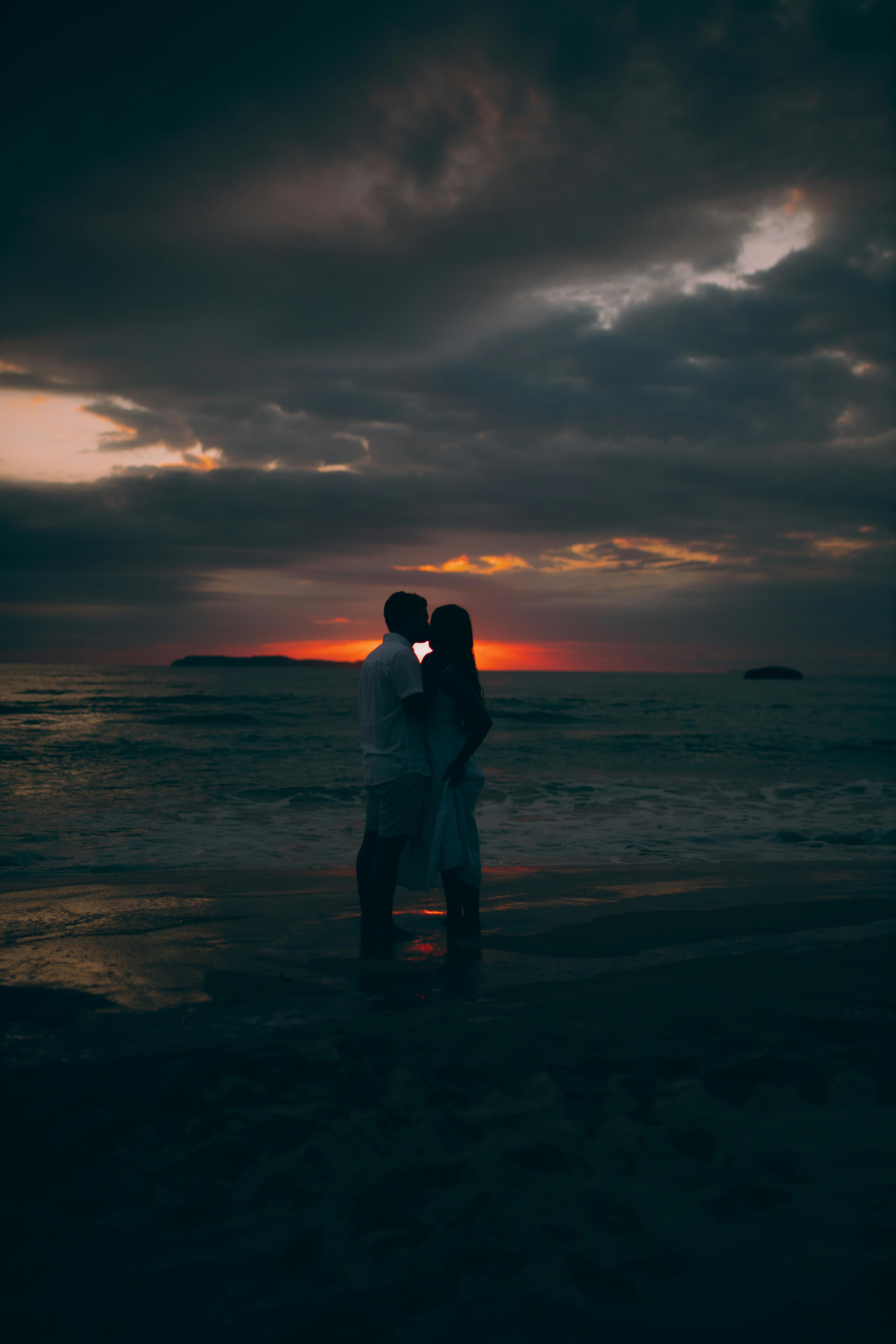 Romantic Sunset Beach Silhouette of Couple · Free