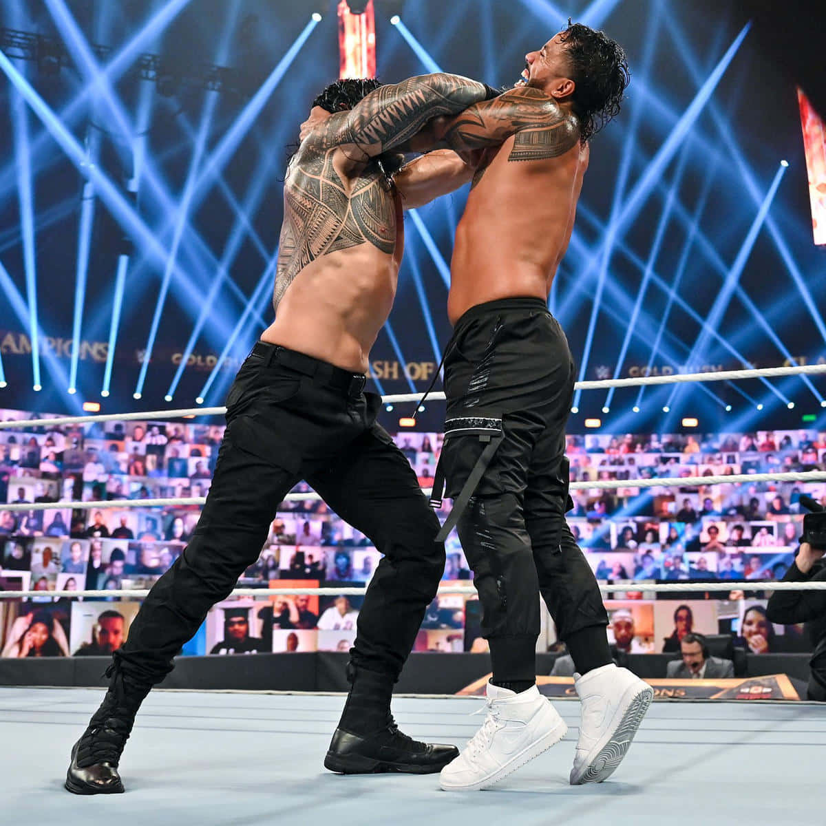 Download Roman Reigns Vs Jey Uso Wallpaper