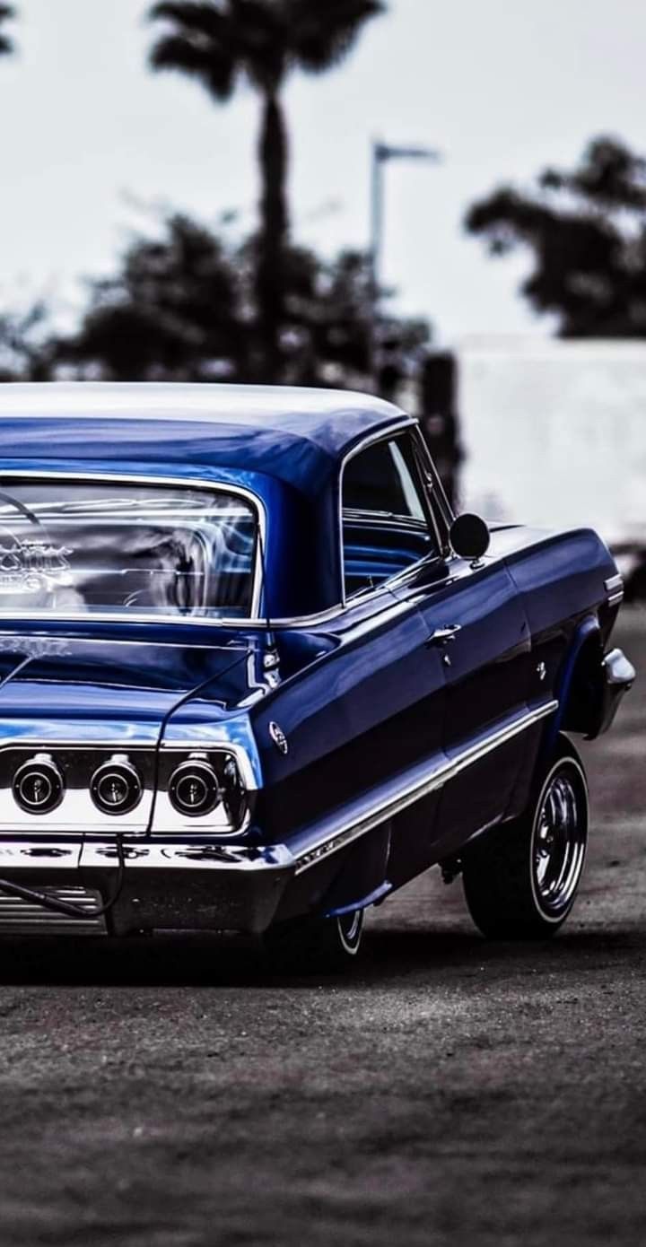Classic Blue Car Parked on the Street