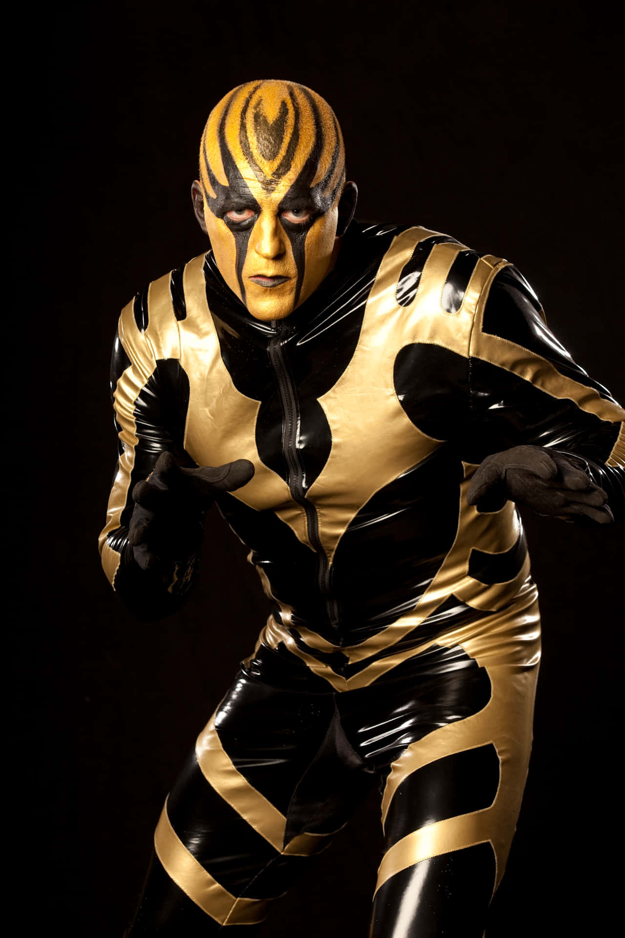 Download Dustin Rhodes Wearing his Iconic Goldust Outfit Wallpaper