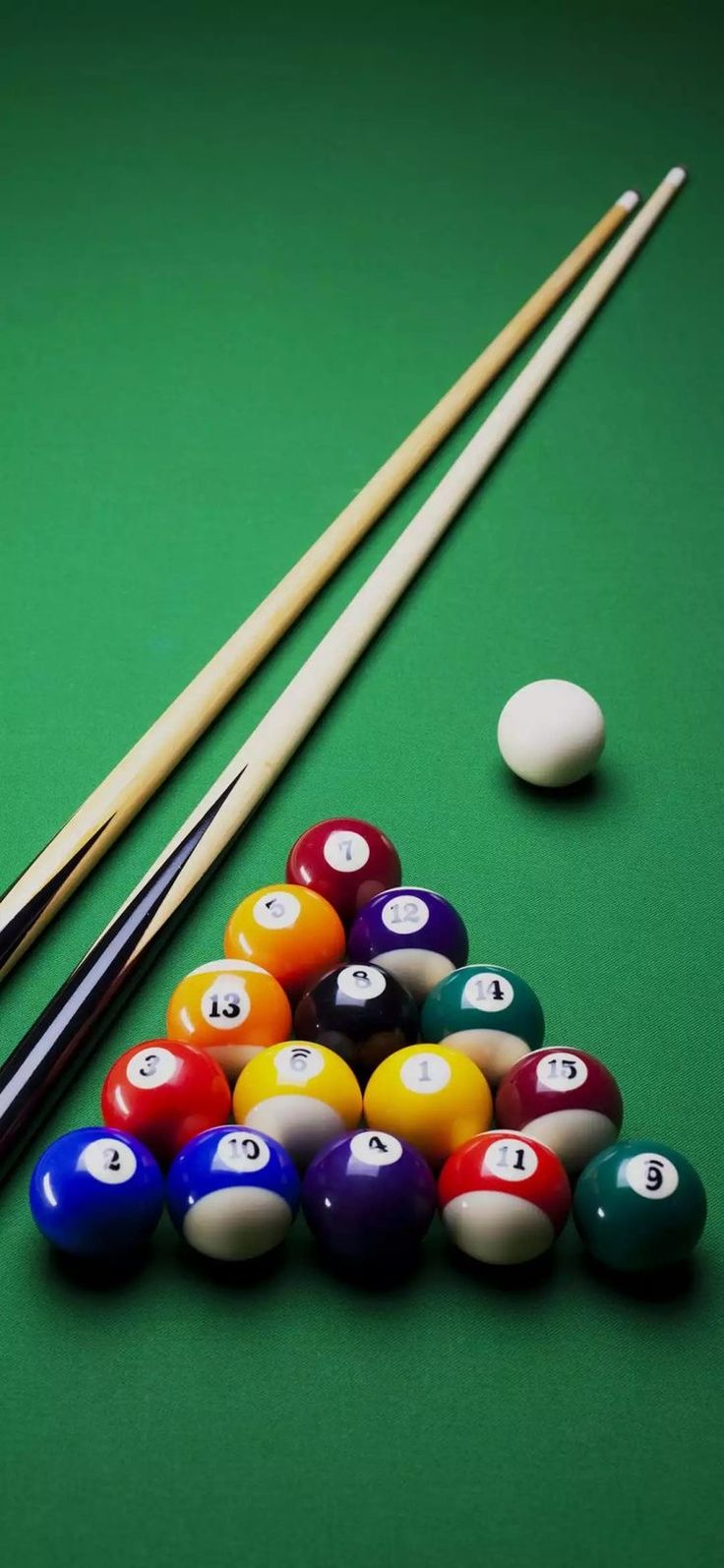 Billiards and Pool Balls on Green Table