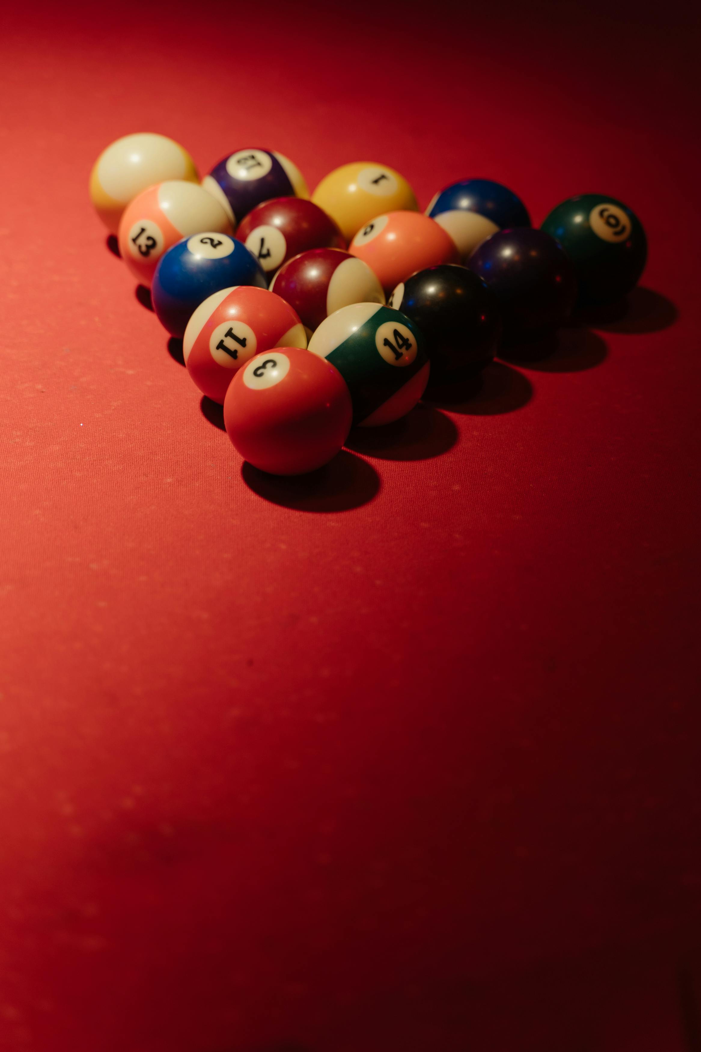 A Set of Billiard Balls on Red Surface · Free