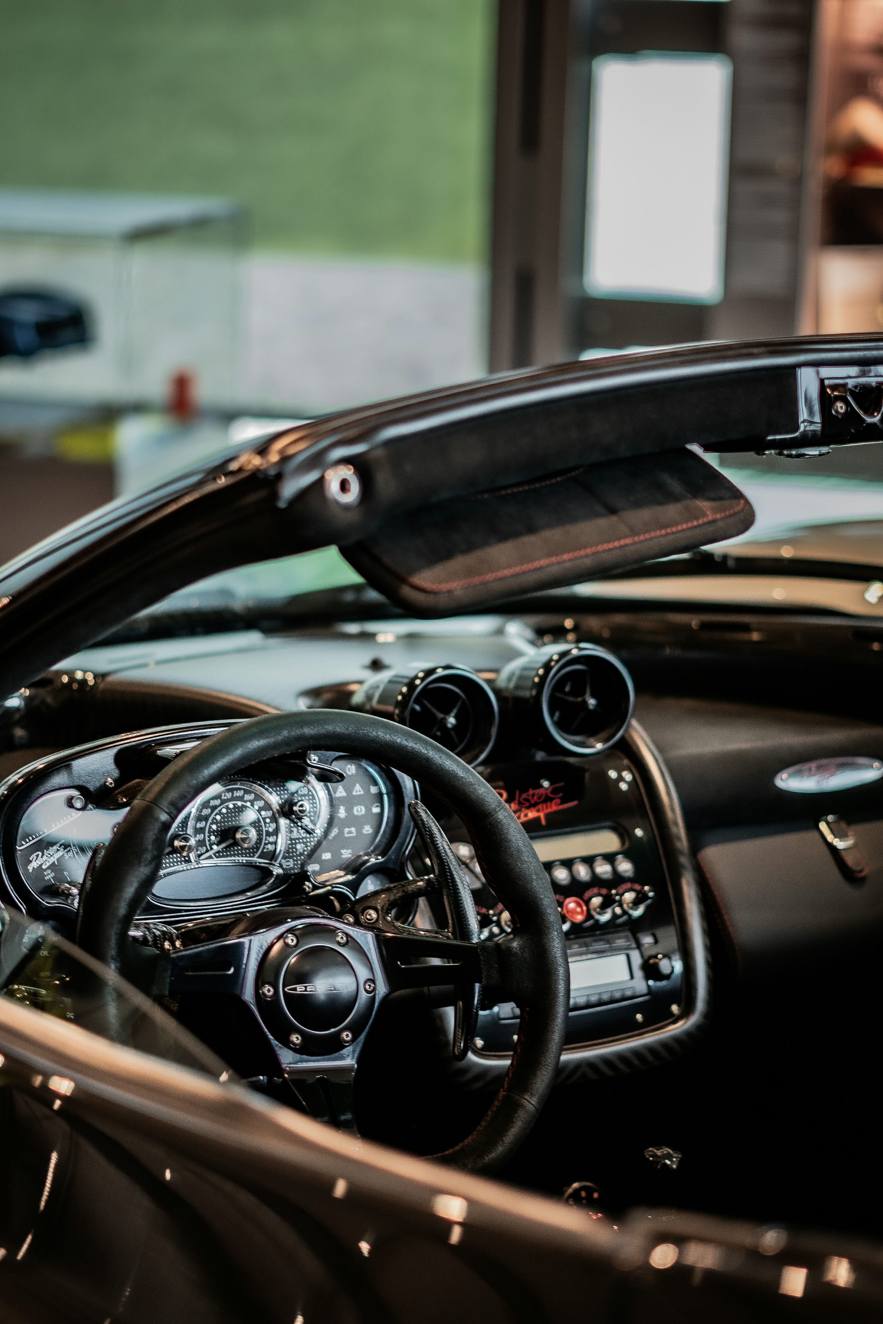The interior of a sports car with blue leather photo