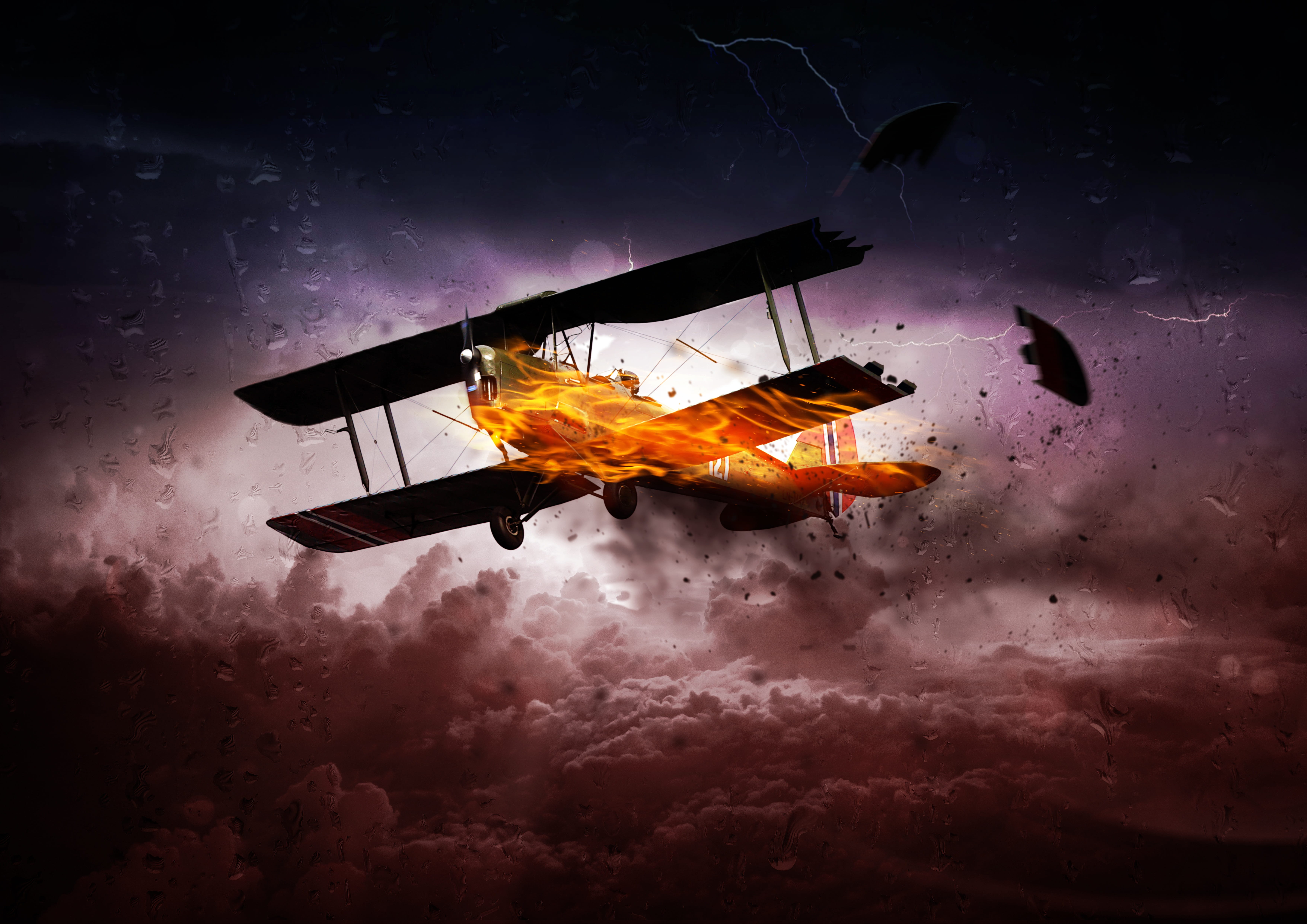 Royalty Free Photo: Burning Biplane Above White And Brown Clouds Digital Wallpaper