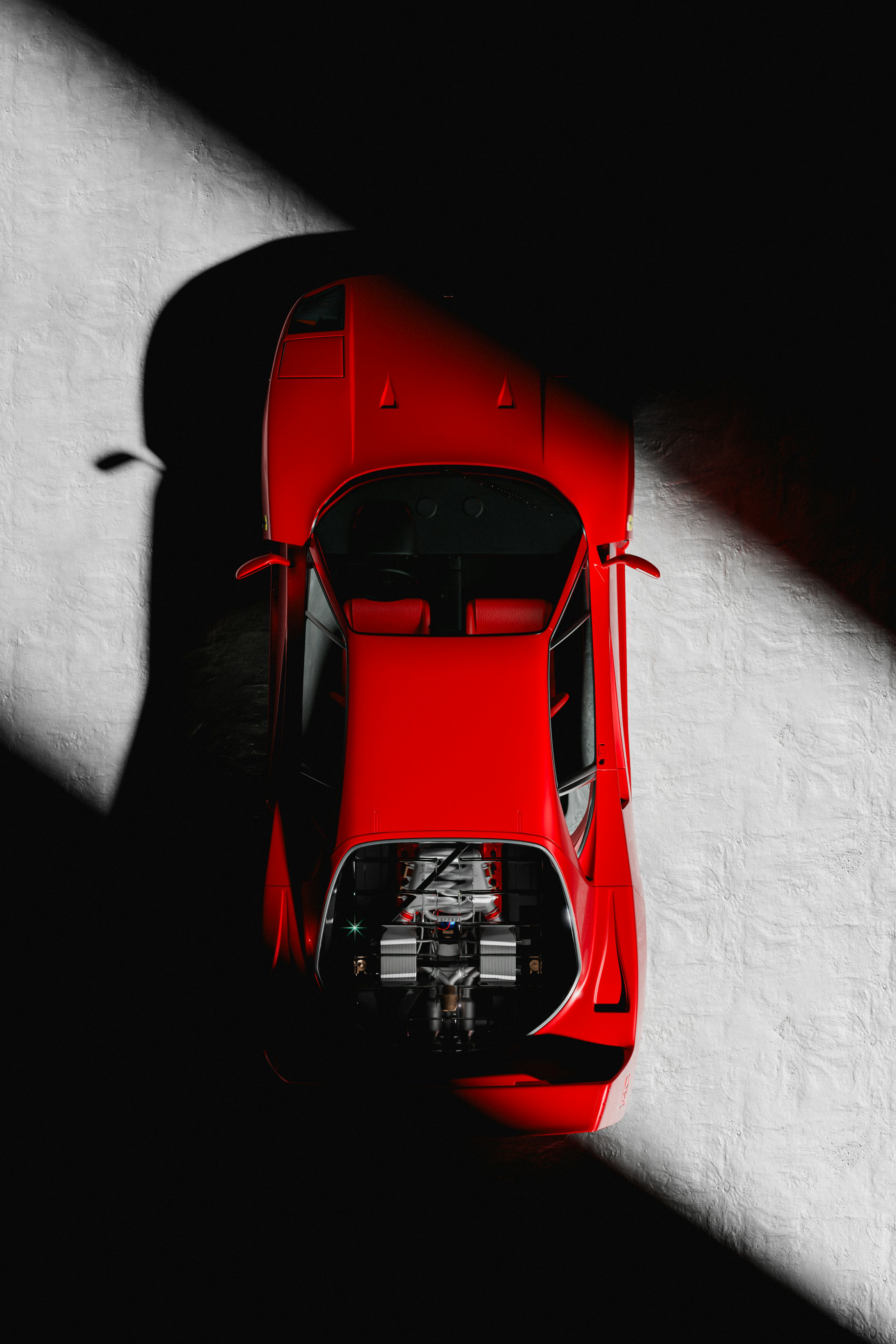 An overhead view of a red sports car photo