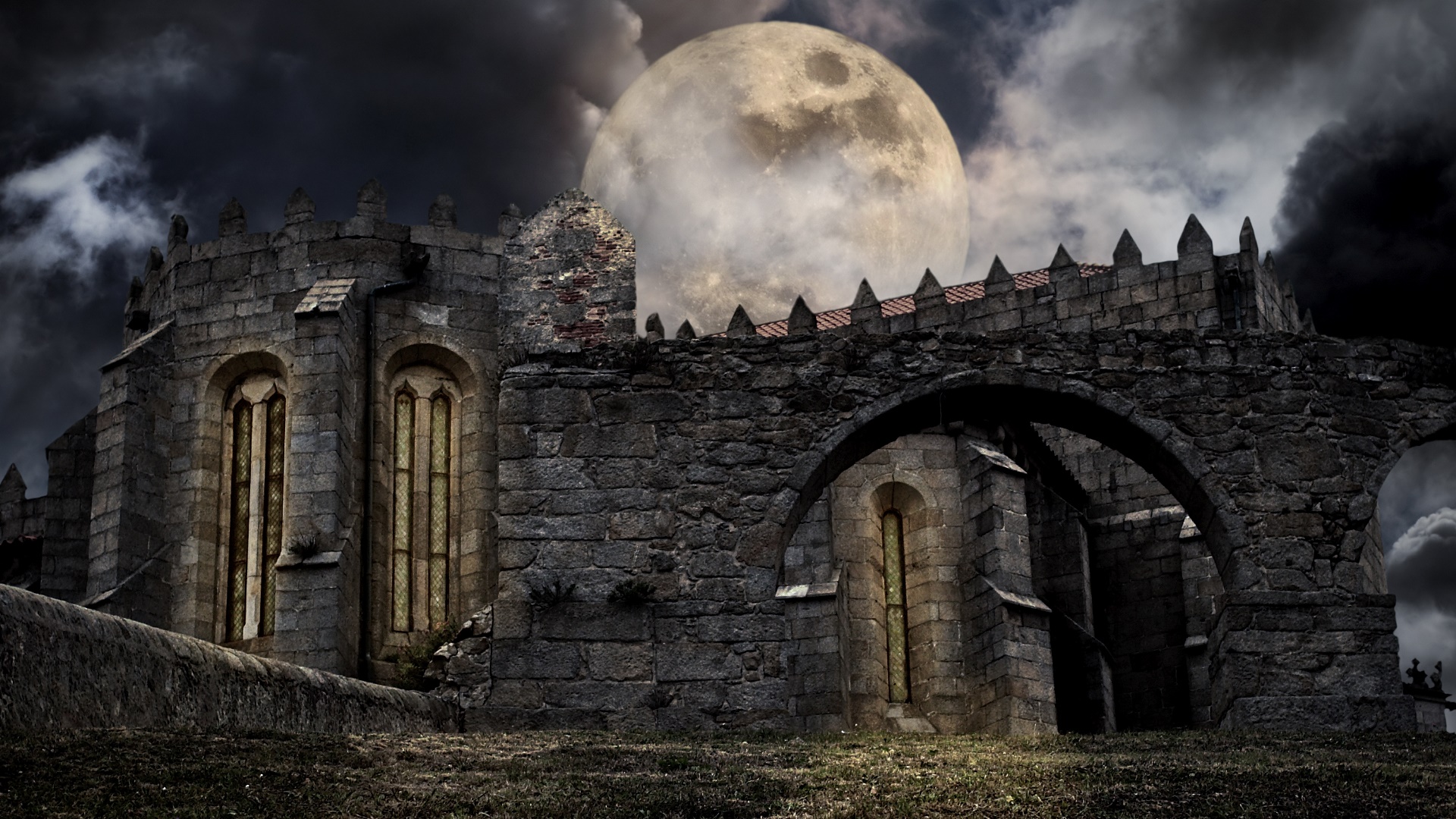 Gothic castle ruins at full mooon